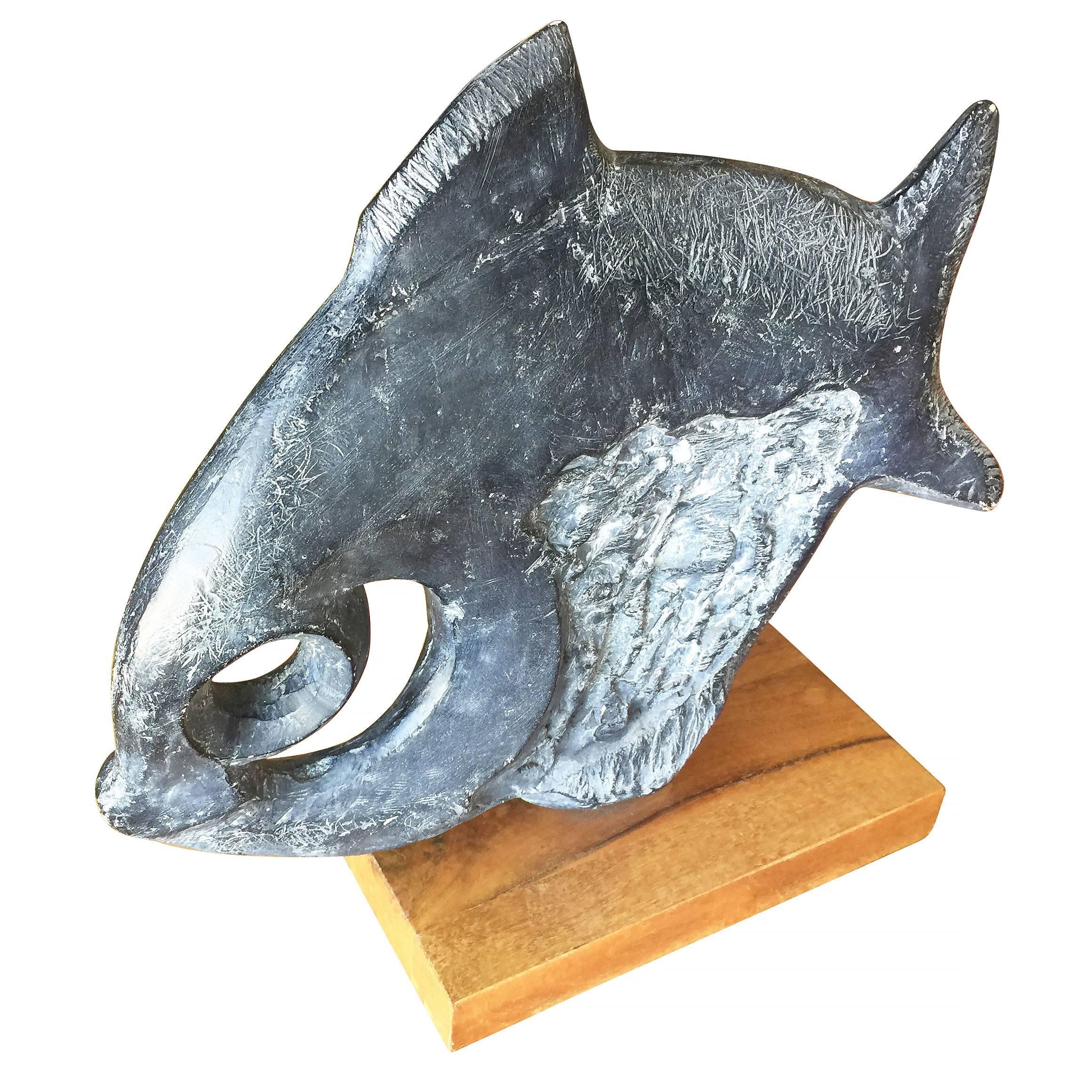 Modernist Austin Productions/Klara Sever black abstract fish sculpture featuring a clay sculpture fixed to a solid hardwood base.

Signed 