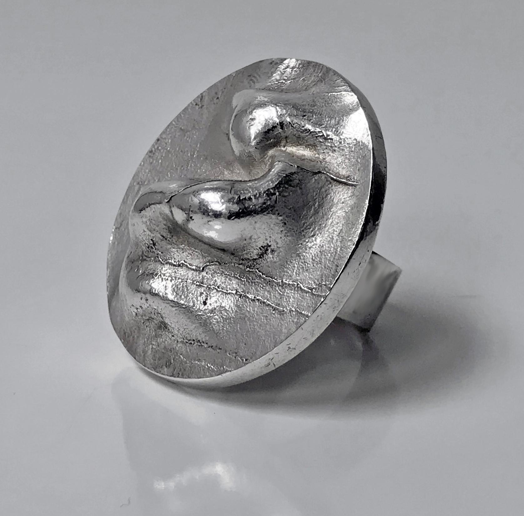 Rare Modernist Lapponia Bjorn Weckstrom Sterling Ring, 1971. The Ring depicting a crater as part of the Space. Diameter of Ring: 1.5 inches. Full Lapponia marks and date letter for 1971. Ring Size: 6.5. Total Item Weight: 22 grams.