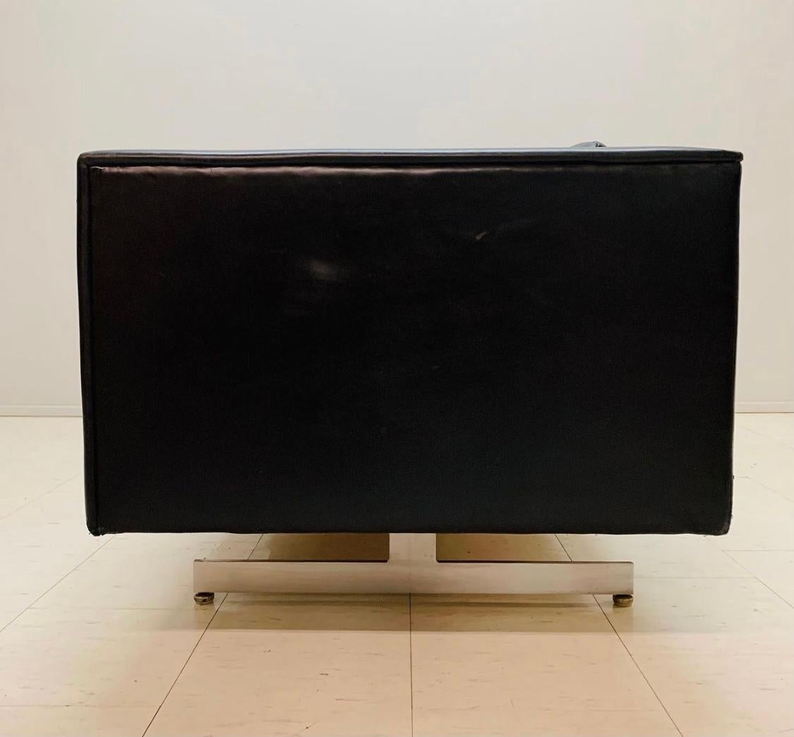 Stunning modernist leather and steel even arm sofa by Christen Sorensen, Ebena / Lasalle, Montreal Canada. Beautiful black saddle leather, age appropriate wear. wonderful patina,,Chromed steel 'T' base, extremely comfortable Hand delivery avail to