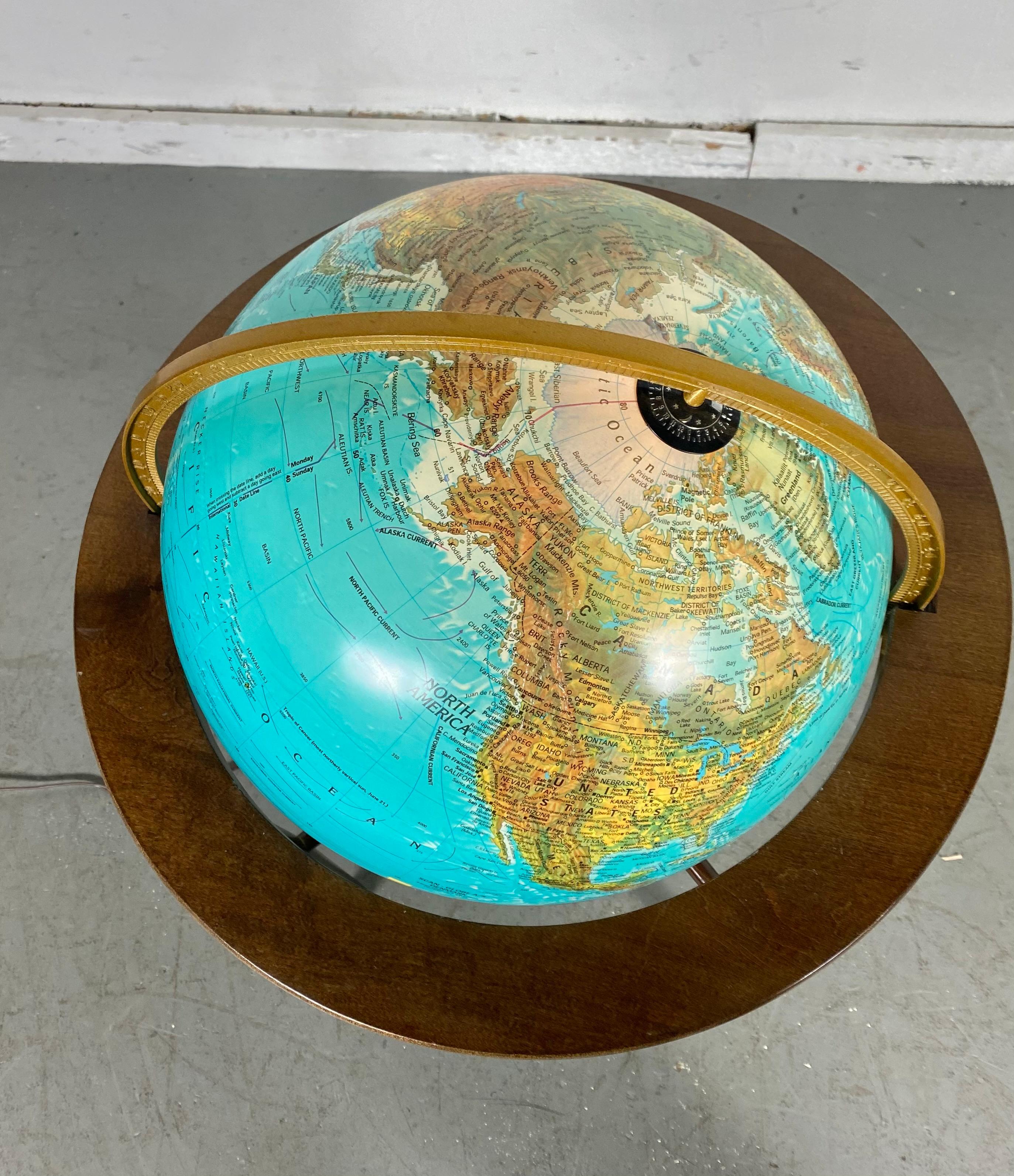 lighted globe on stand