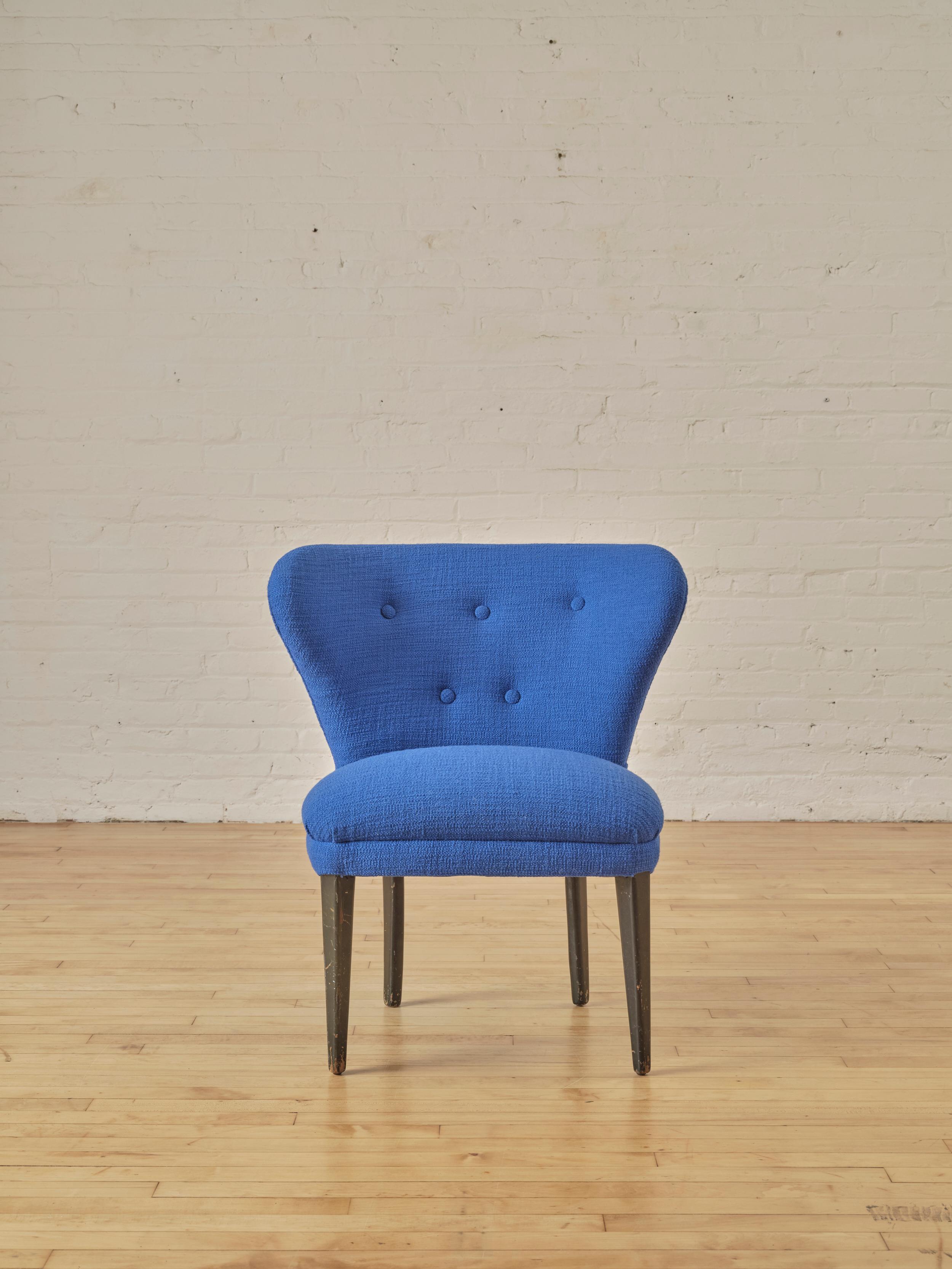 Modernist Lounge Chair with a wide backrest and black wooden legs, recently reupholstered in Dedar Milano's 'A Perfect Flower' fabric in Cobalt Blue.