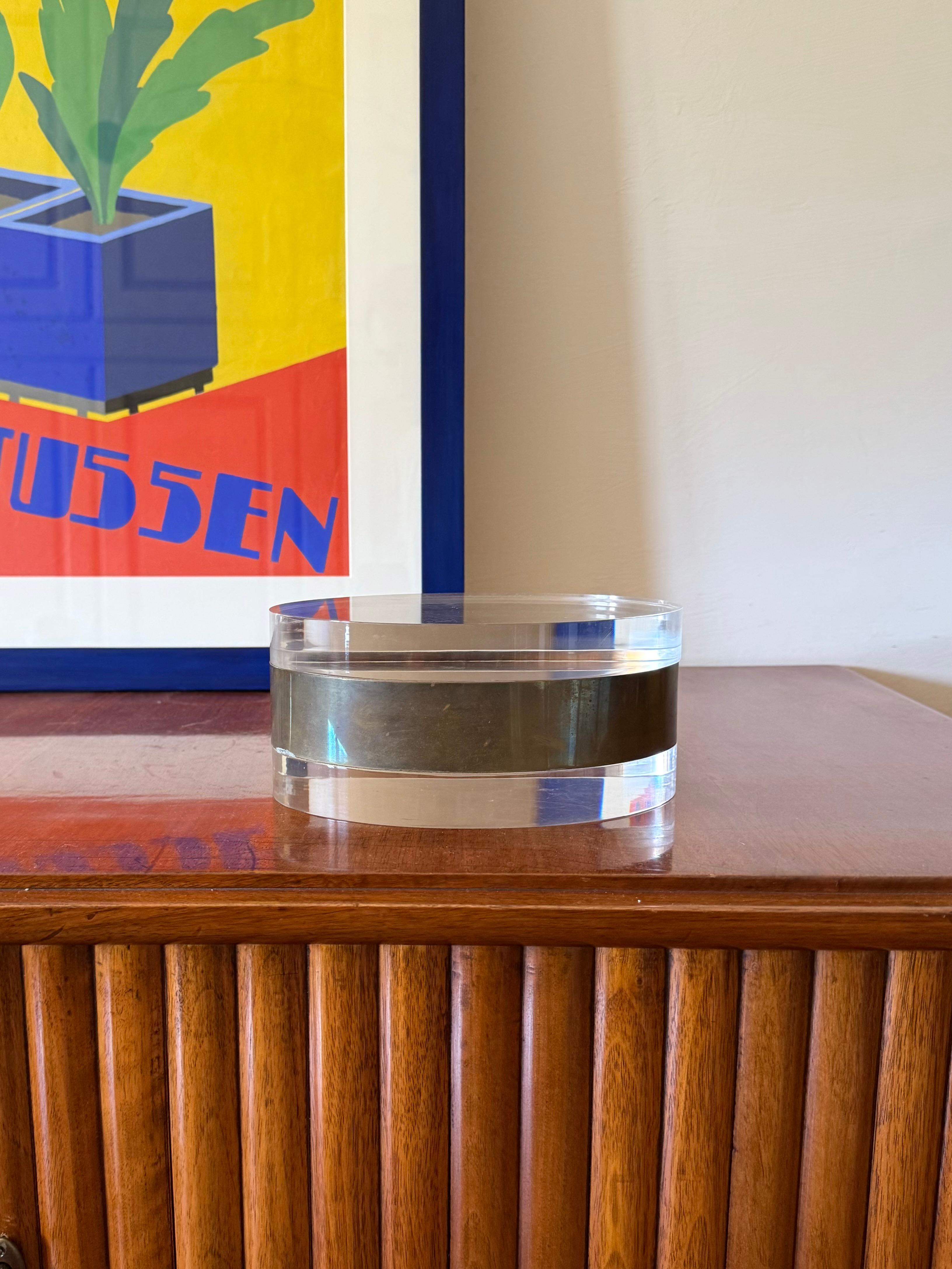 Modernist lucite and silver-plate box

Italy 1970s

silver-plated metal, lucite

H 9 × 20 × 14 cm

Conditions: very good consistent with age and use