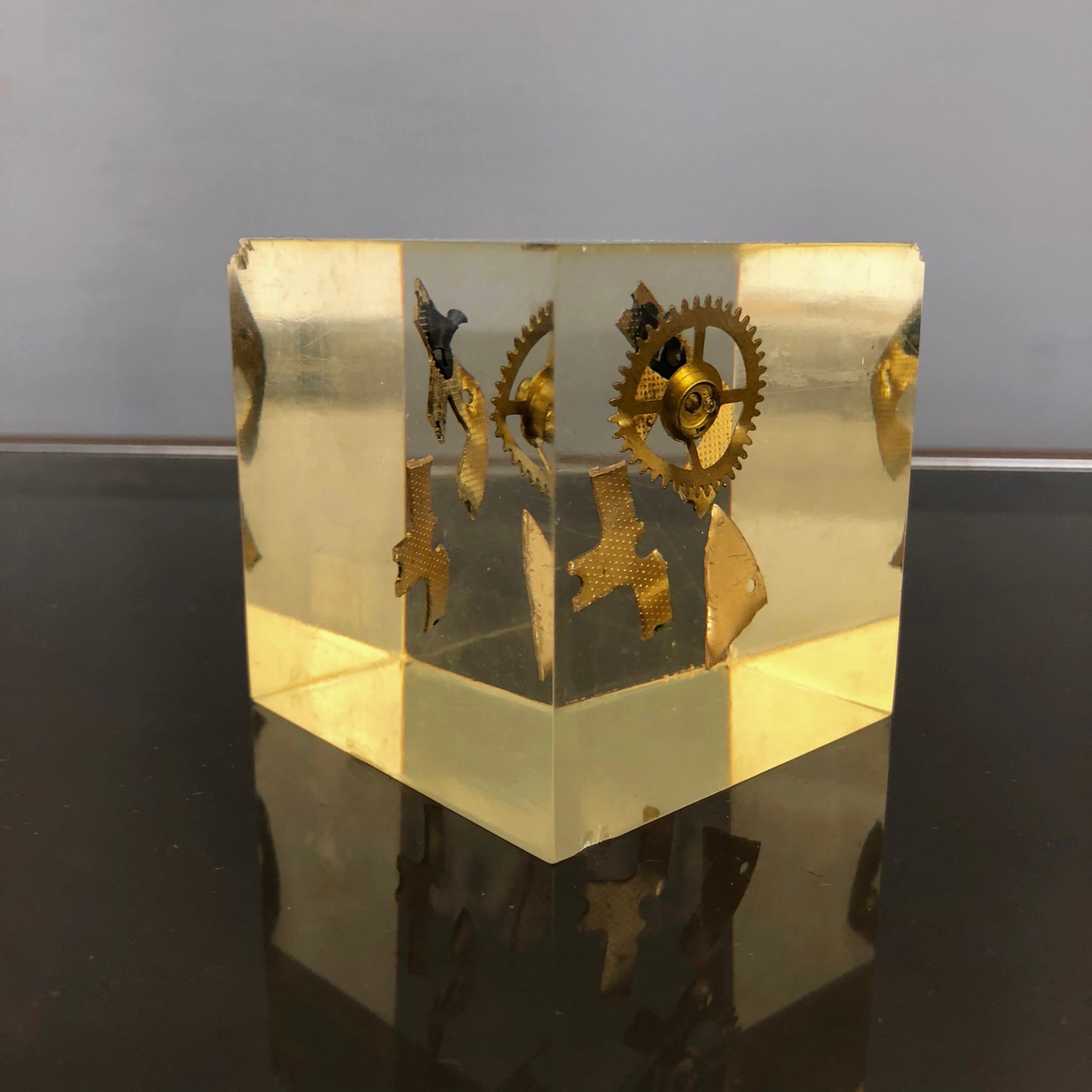 Lucite resin cube with gears inside attributed to Pierre Giraudon, circa 1970.
 