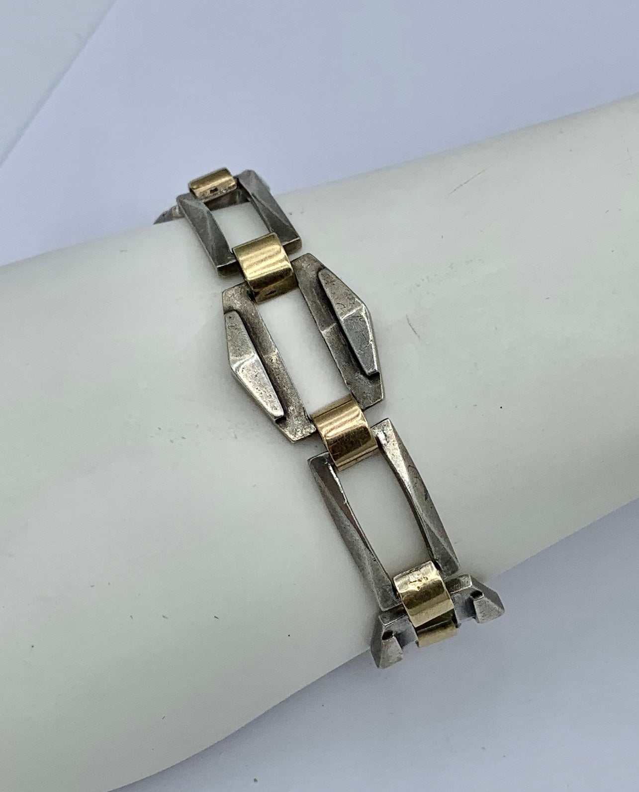 This is a wonderful Modernist Machine Age Art Deco Bracelet in Sterling Silver with Gold dating to circa 1920-1930 from Barcelona.  The Spanish modernist designs are of the highest quality.  The silver work is heavy and substantial.  The Barcelona