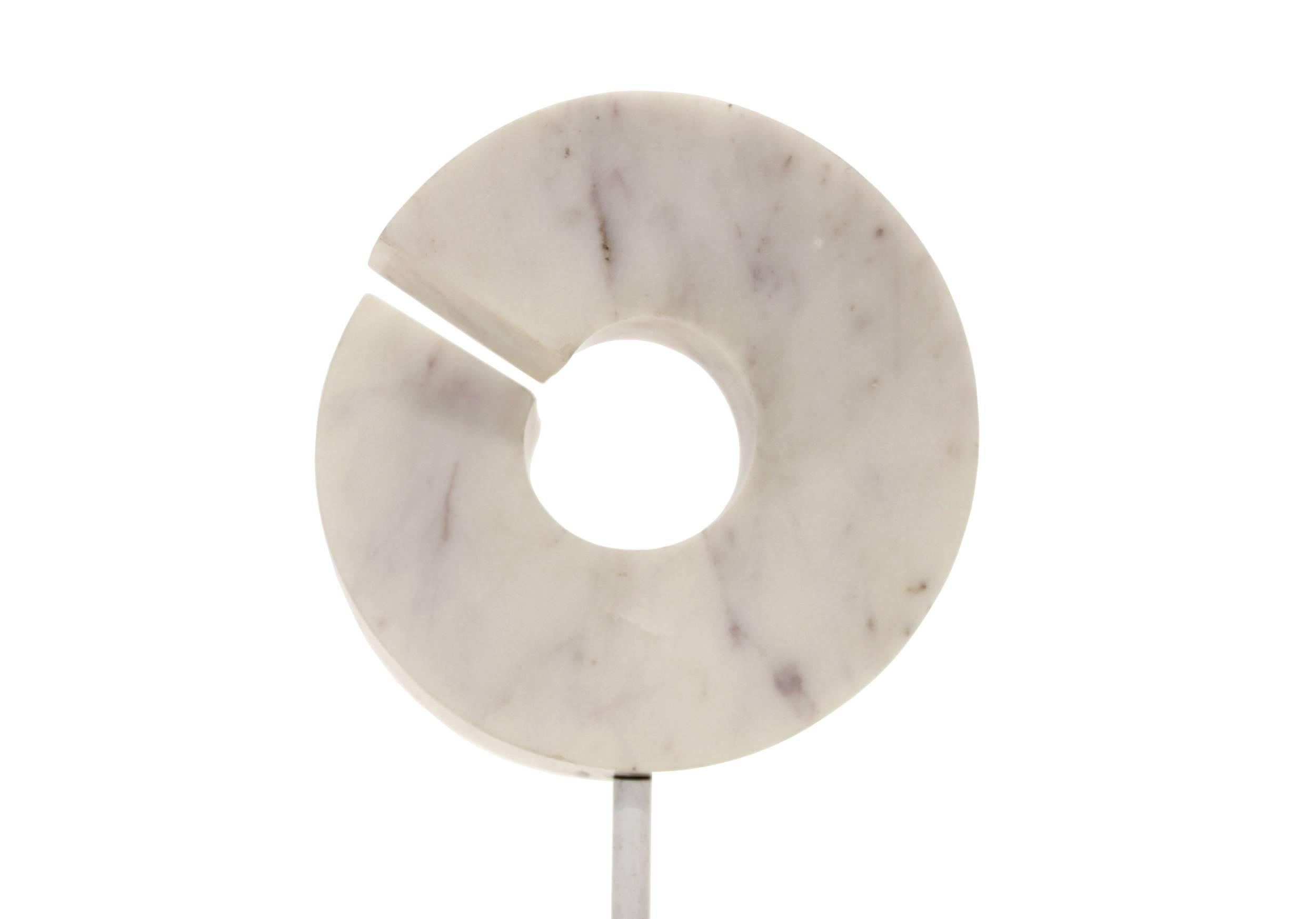 Organically shaped circular composition in marble. Made by Hilde Van Sumere, Belgium, circa 1970s first half. The sculpture is in excellent vintage condition. The sculpture is unsigned.