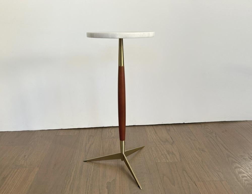 Decorate a den or living room with this striking side or drink table from the late 20th century. In the likes of Paul McCobb for Thonet and George Nelson & Associates for Herman Miller. Each minimalist side table features a round white and grey