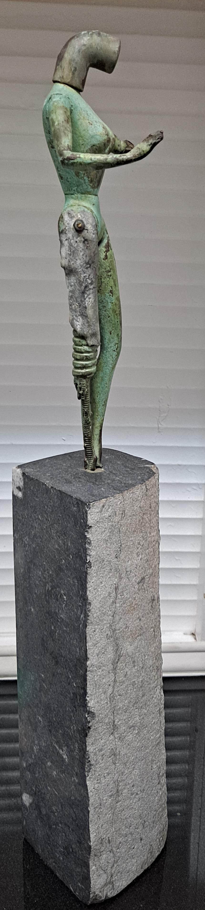 Modernist Metal Sculpture of a Female Form Fixed on a Tower of Granite Base

Signed 