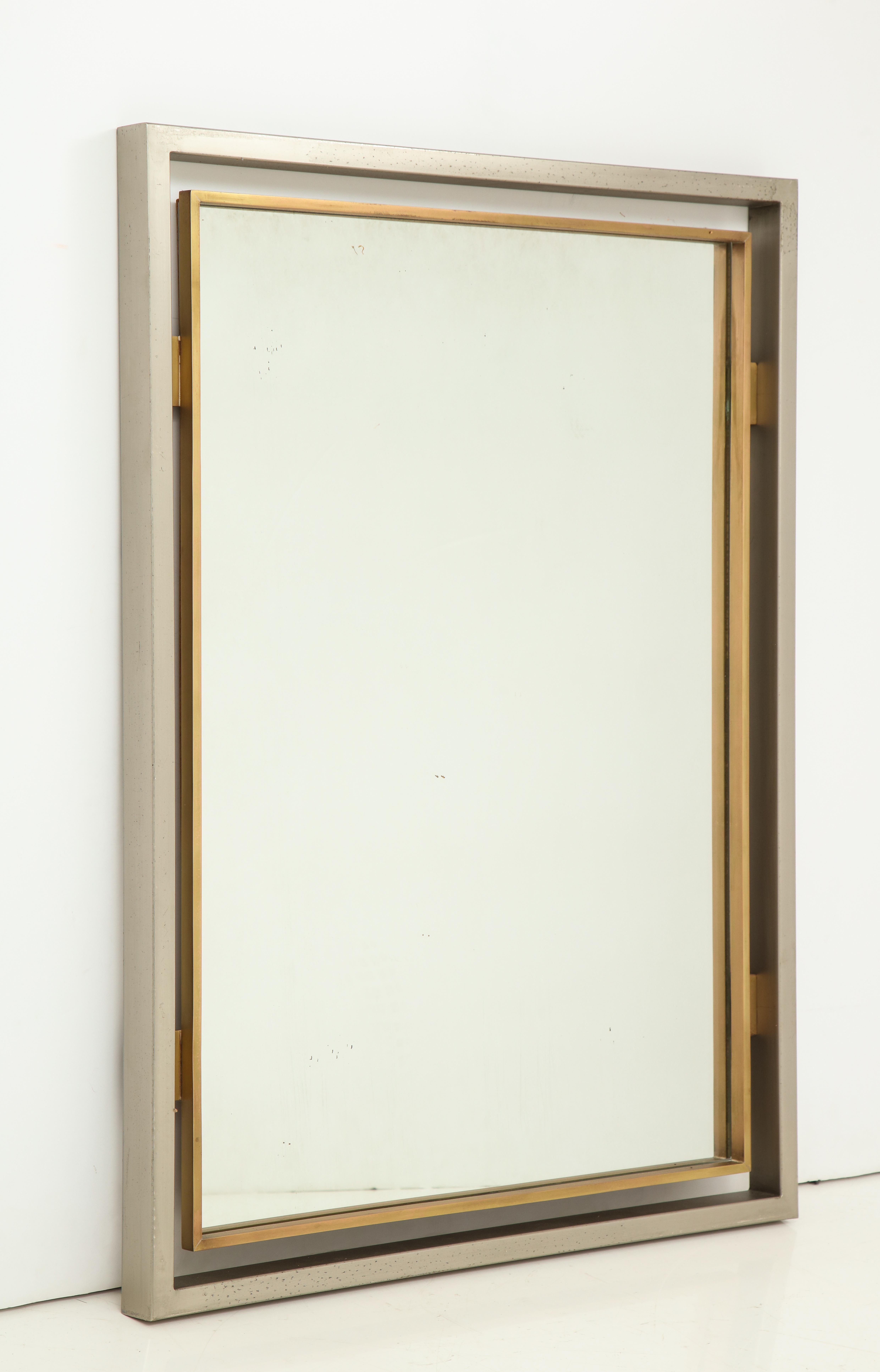Solid steel and brass elegant mirror by Guy Lefevre for Maison Jansen
Rare
Minor spots on steel frame
Else in great vintage condition.
 
