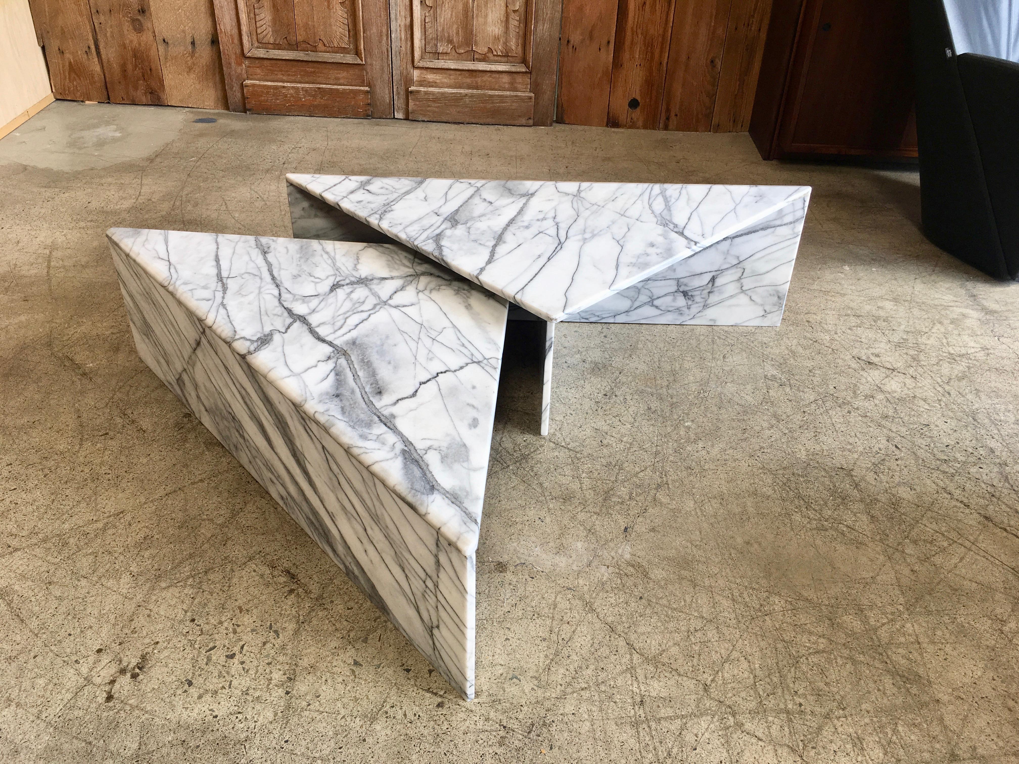 Very striking Statuario white marble with grey veins in two triangle forms that can be arranged in many different ways.
Both tables are the same width 51.75