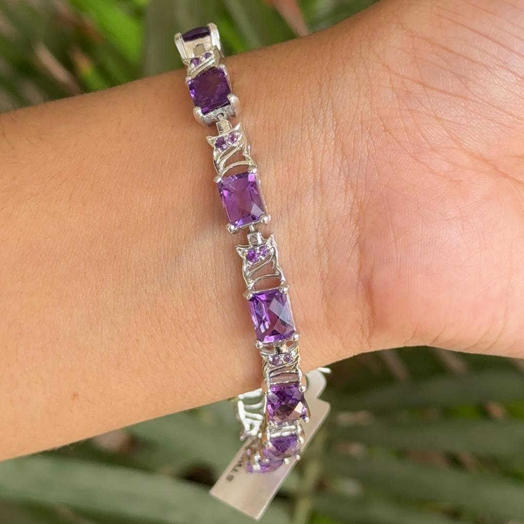 Modernist Natural Amethyst Gemstone Tennis Bracelet for Wedding Gift in sterling silver showcases endlessly sparkling natural amethyst, weighing 19.9 carat. It measures 7.5 inches long in length.
Natural Amethyst stimulate concentration and reduces