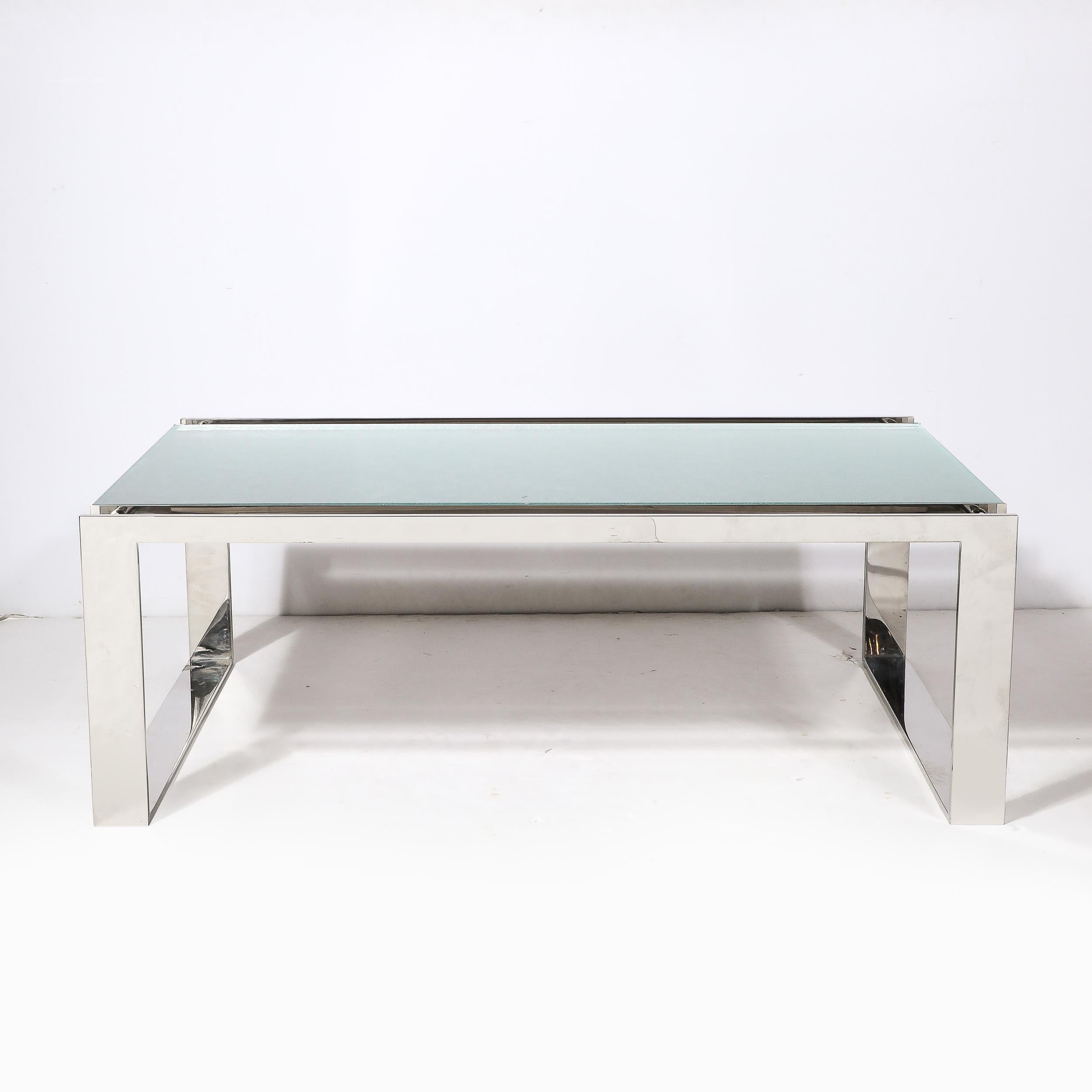 This sleek and substantial Modernist nickel and Lucite Glacial Cocktail Table is by Lorin Marsh and originates from the United States during the late 20th Century. Features a rectilinear construction in bands of polished nickel composing the base