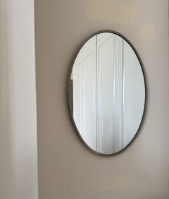 Modernist nickel on brass oval mirror