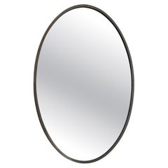 Modernist nickel on brass oval mirror
