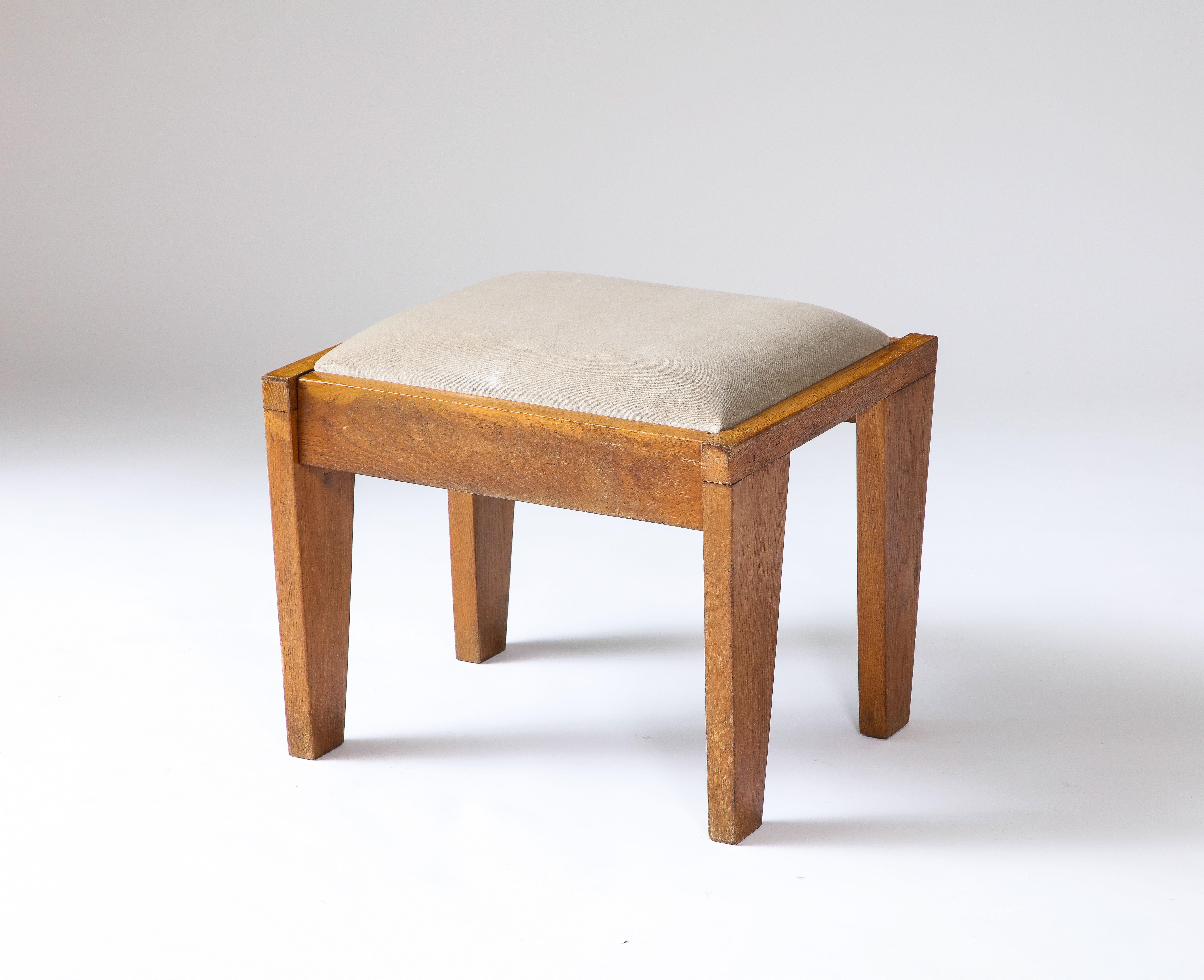 Two available; priced individually.

Large, angular stool made of beautifully patinated oak.