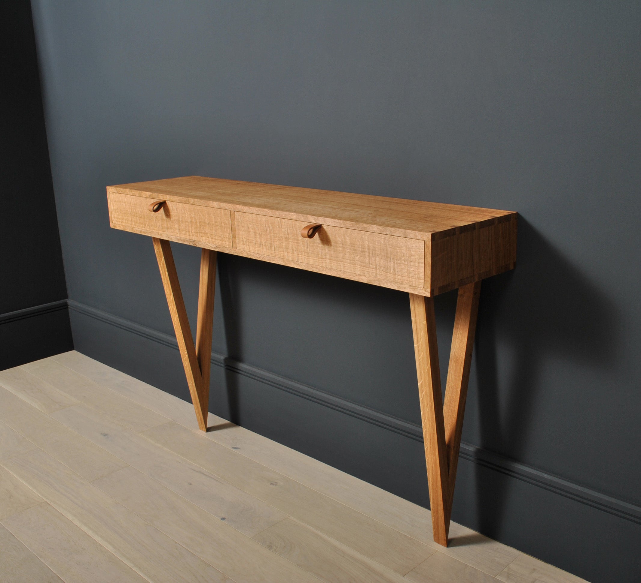 Modernist oak vanity table with two drawers - designed and completely handmade in England using traditional furniture making techniques. Skilfully handcrafted from the finest fully quarter-sawn English oak. Hand dovetailed joints to the main oak box