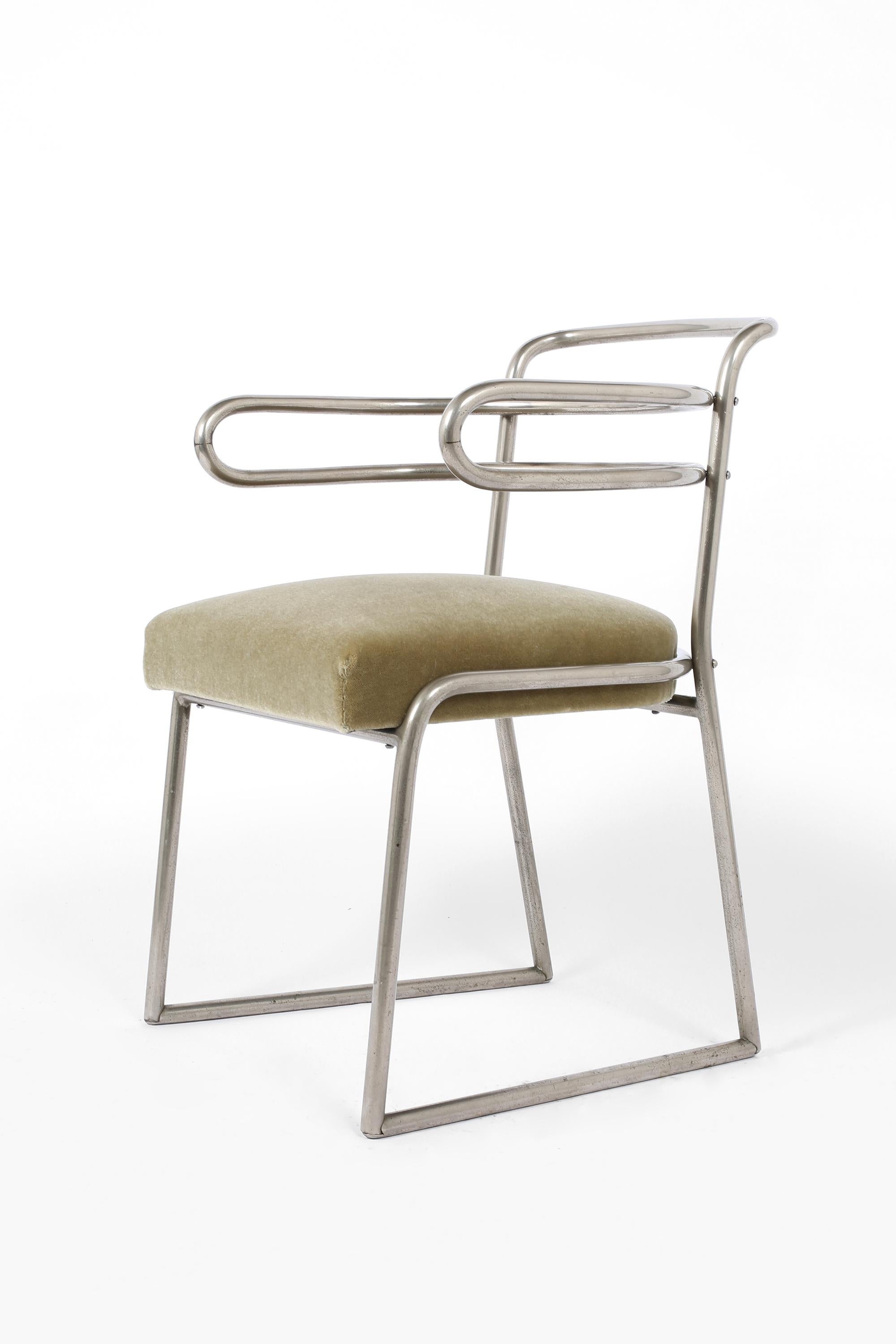 A rare armchair by modernist designer Louis Sognot. Featuring a nickel plated tubular steel frame, and sprung seat reupholstered in sage green mohair velvet. French, c. 1920s.
