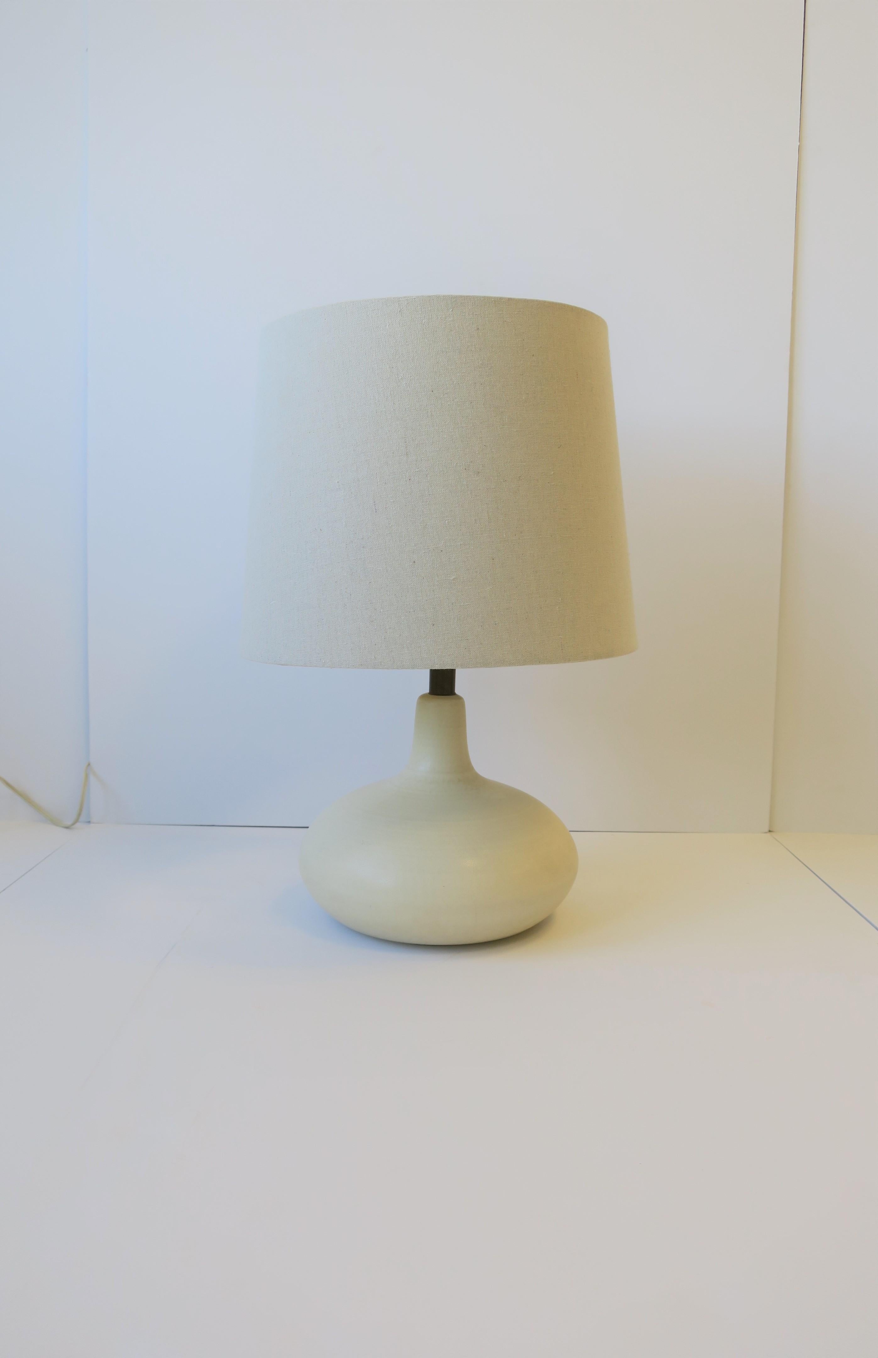 white pottery lamp