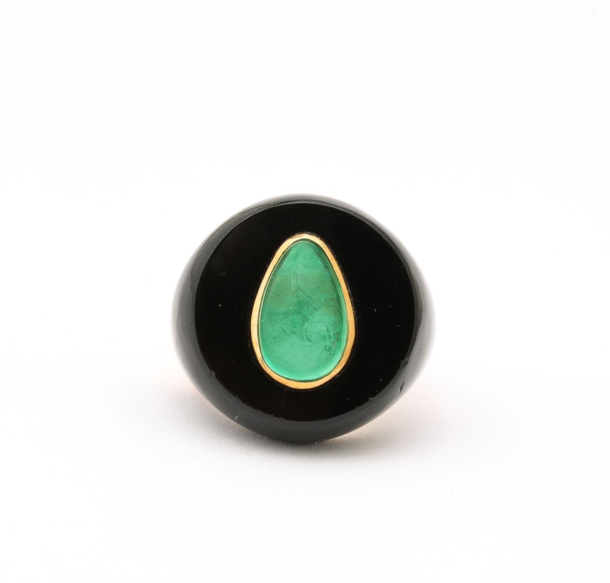 18K Yellow Gold and Onyx Designer Ring with a Pear cut Emerald. Stone Size 12.5mm x 8mm, Cross weight 21.63 g ,Ring Size 6.5