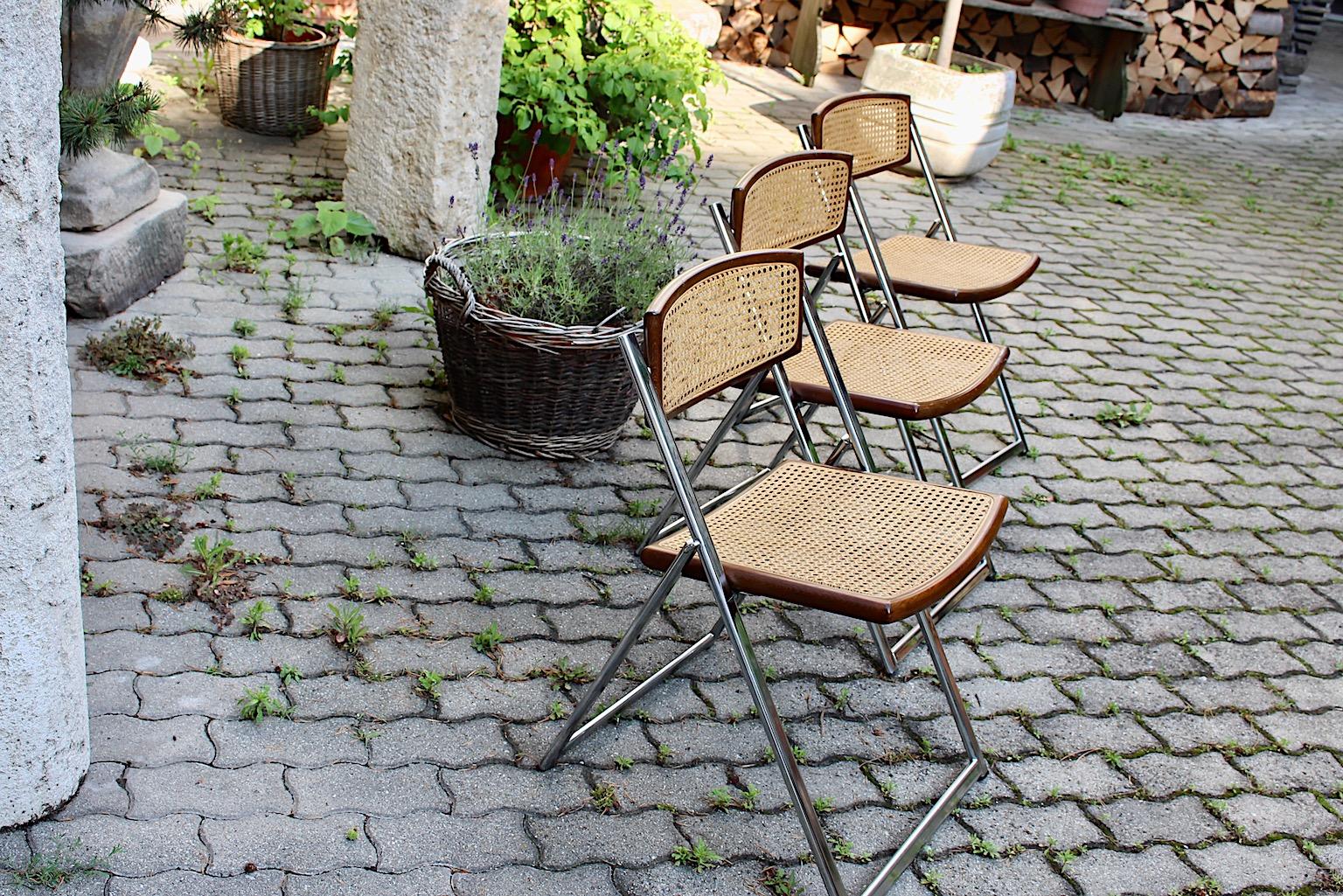 Modernist organic vintage three vintage chromed metal, beech and 
Viennese mesh dining chairs or chairs, 1970s, Italy.
A wonderful set of three (3) dining chairs with a chromed metal base, while the seat and back are framed with beech and Viennese