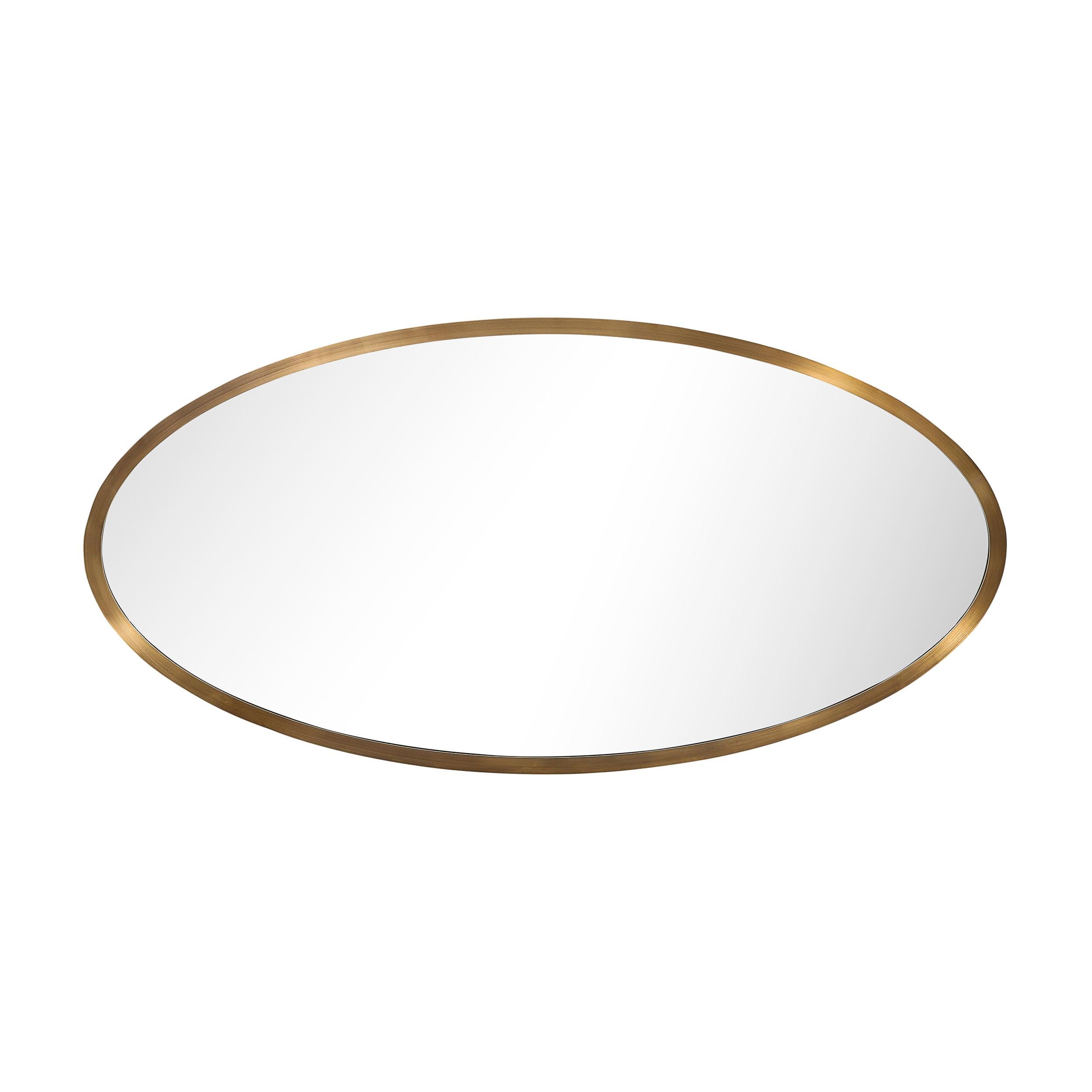 This custom-designed mirror by High Style Deco embodies sleek modernist elegance with a sophisticated nod to timeless craftsmanship. The oval-shaped central mirror is bordered by a striking rectilinear frame in a rich antiqued brass finish, which
