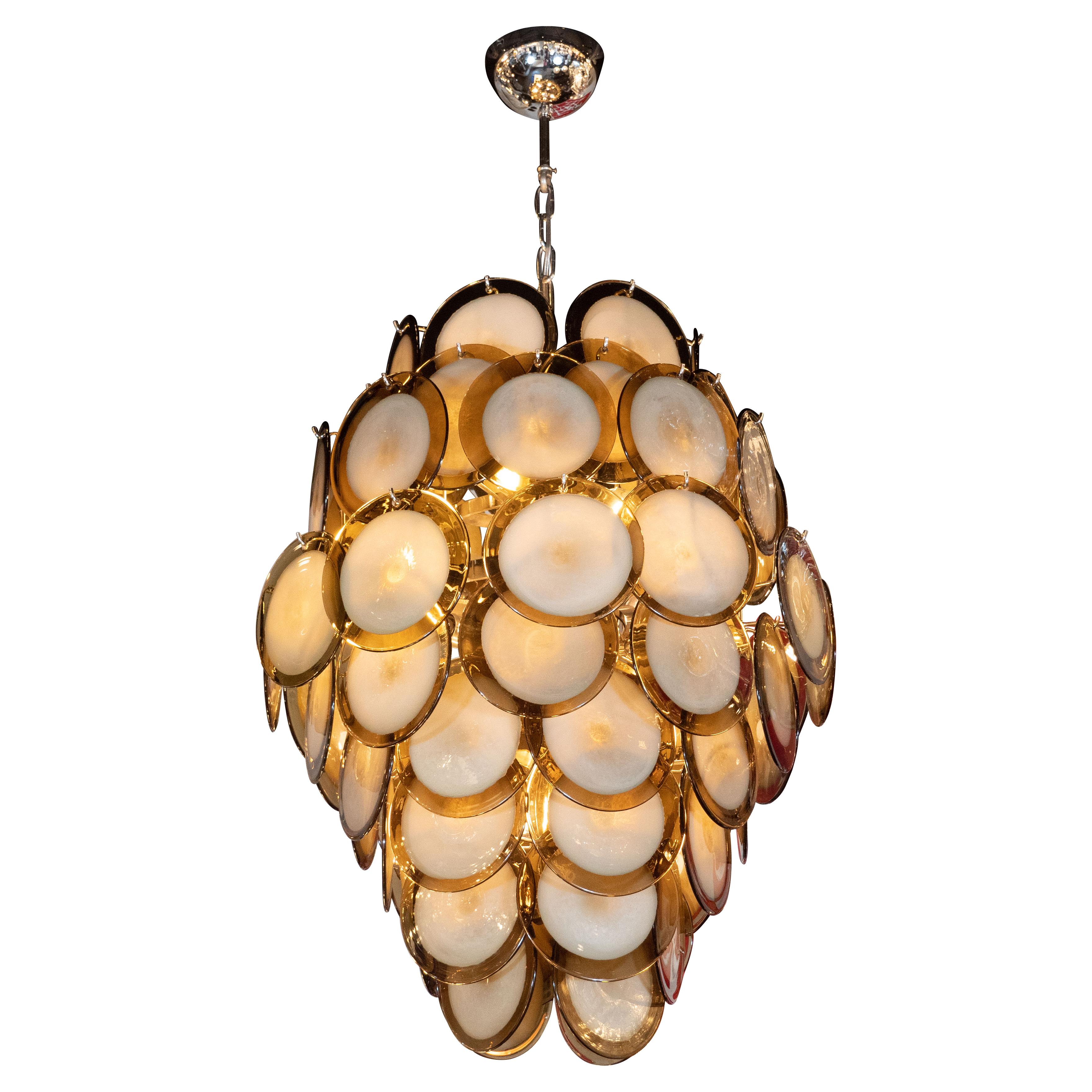 This stunning modernist chandelier was realized by our atelier in Murano, Italy- the island off the coast of Venice renowned for centuries for its superlative glass production- exclusively for us. It features a pagoda form composed of an abundance
