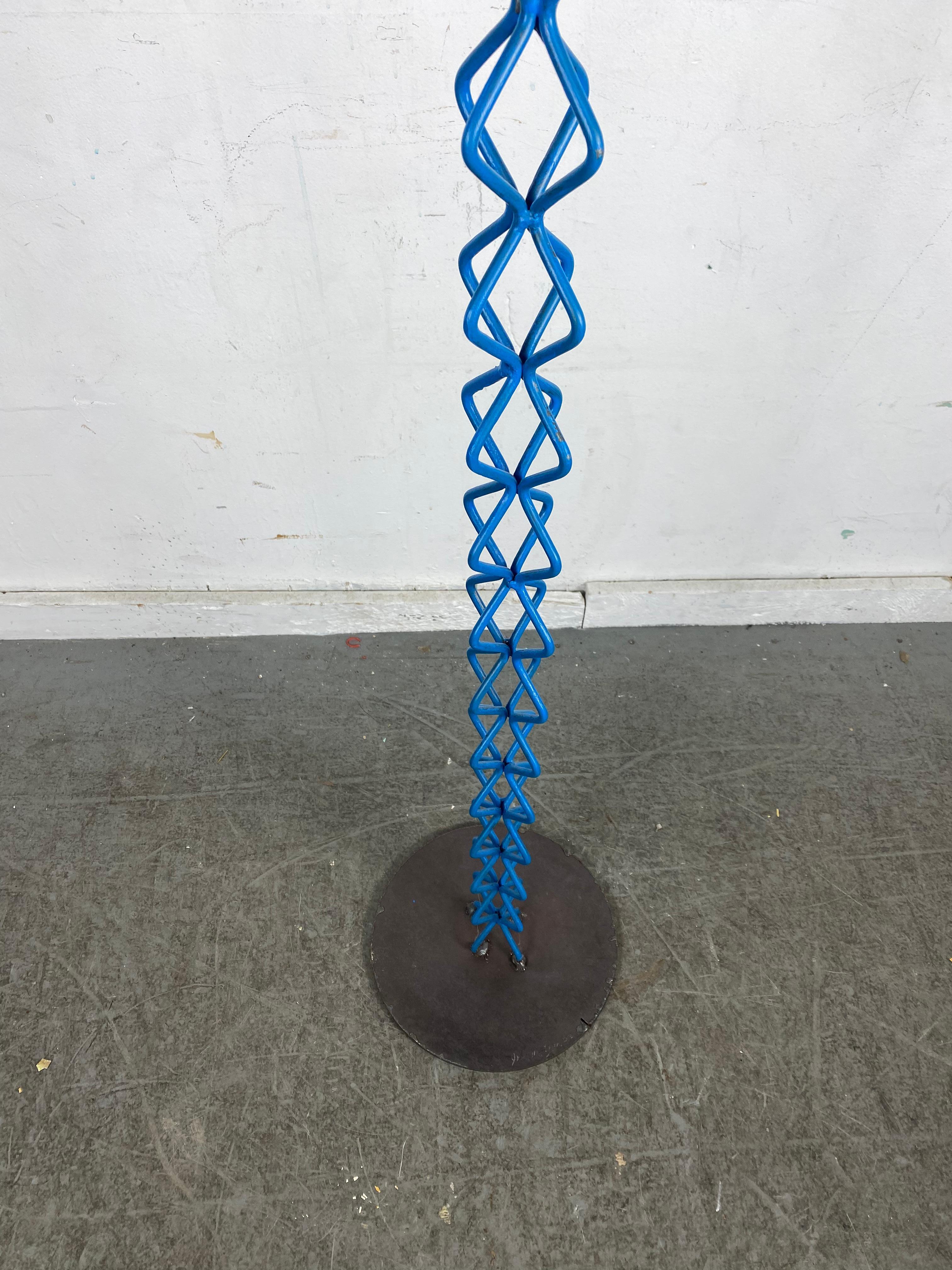 Late 20th Century Modernist Painted   metal/ steel Sculpture by John Metzen.. Over 7 feet high.. For Sale