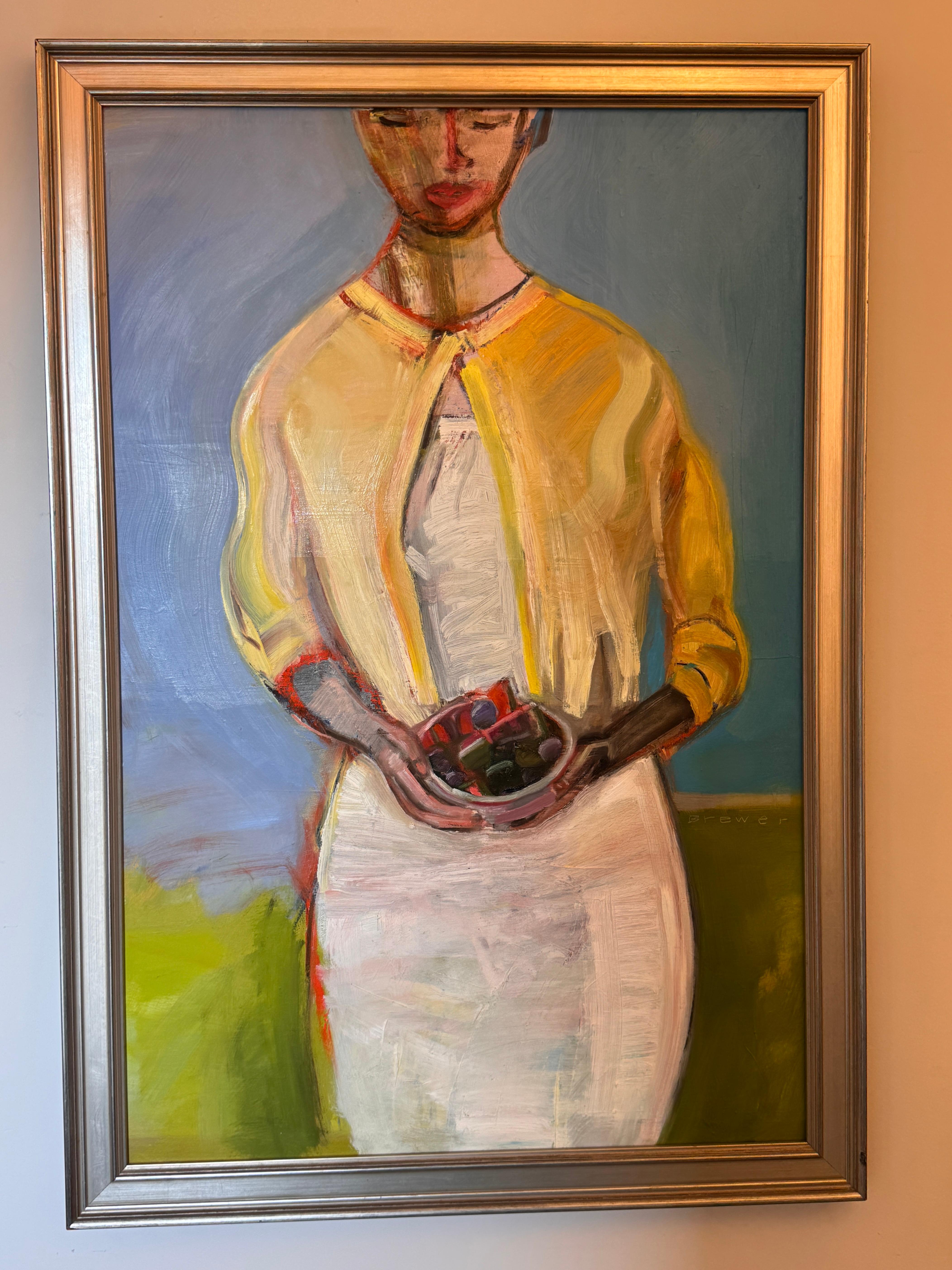 Boldly composed and richly colored, this modernist painting depicts a woman in a yellow cardigan holding a bowl of fruit. Broad, expressive brushwork and simplified form lend the figure a quiet monumentality, while the color contrasts and stylized