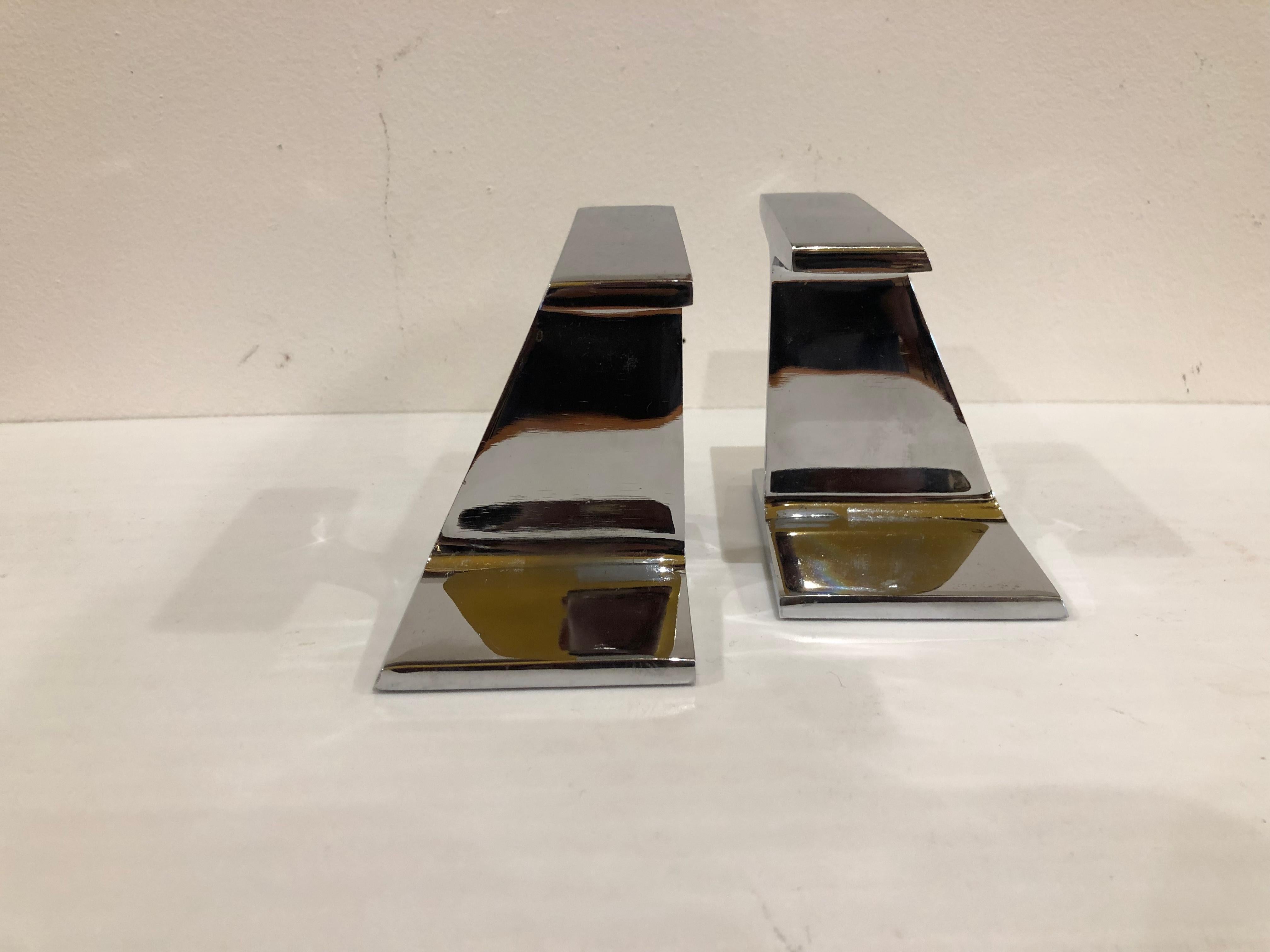 Modernist pair of steel I beam bookends by bill curry for design line, rare set to find in great condition have a commemorative label for Kaiser steel.