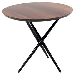 Modernist Parcel-Ebonized Walnut Tripod Table