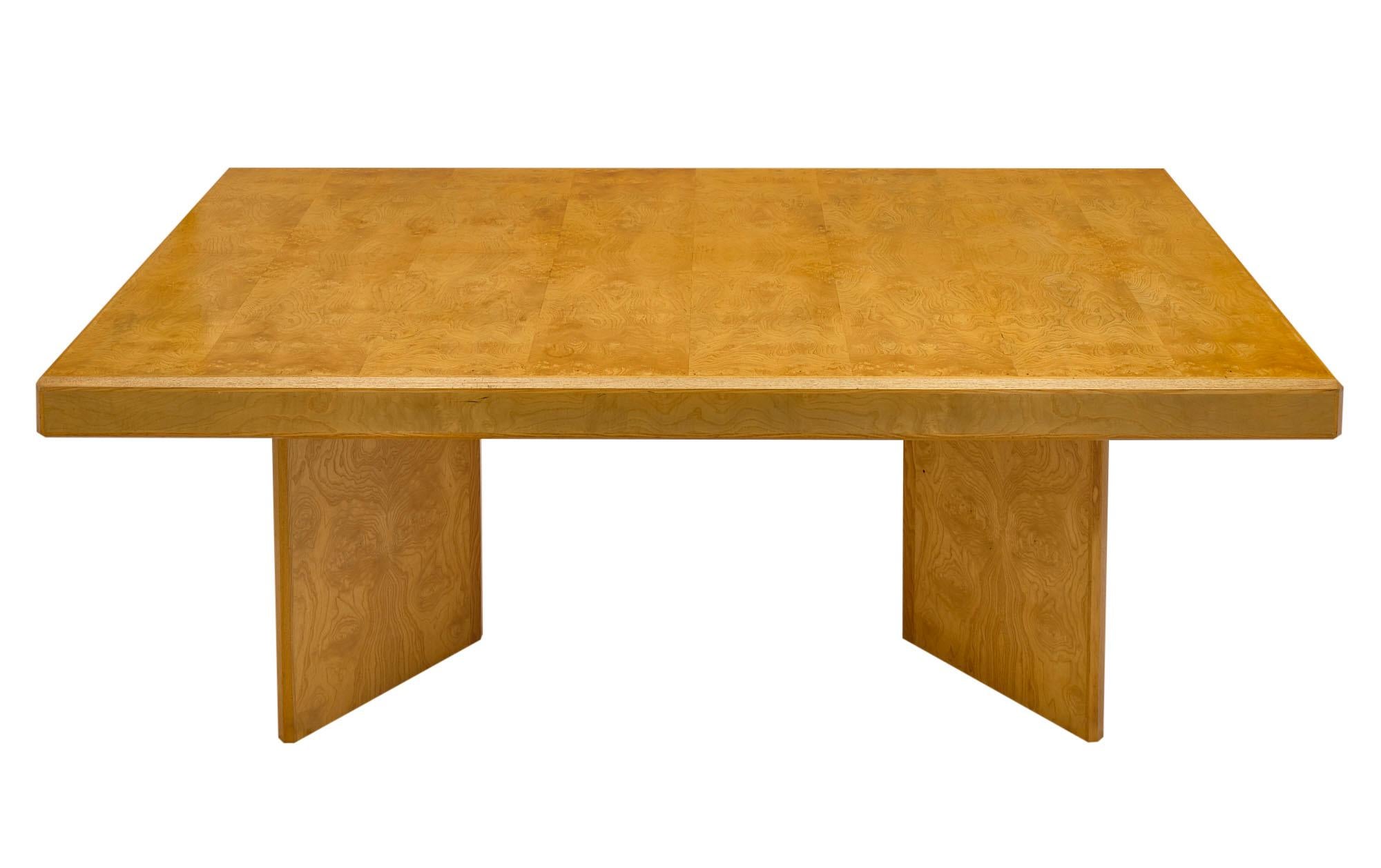 Modernist period French dining table in the manner of Charlotte Perriand. This piece is made of burled ash veneer with strong lines and presence!