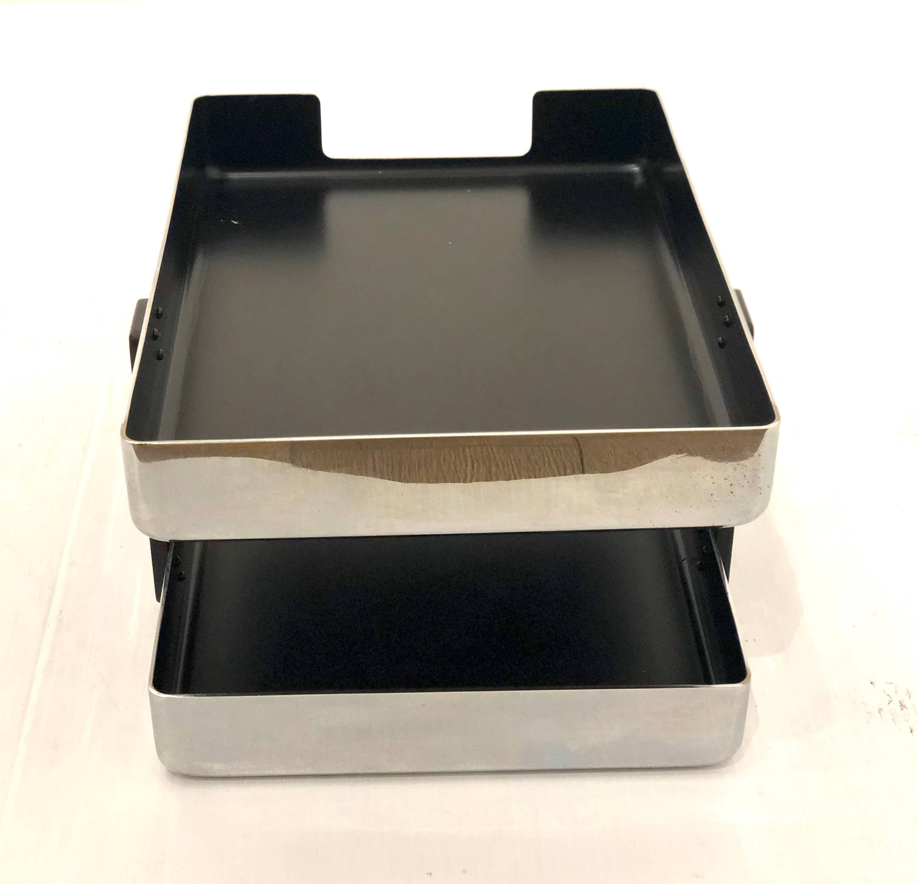 Double letter tray in polished aluminium finish with black enamel lining by Metcor. Very nice accent to any executives desk! California design.
  