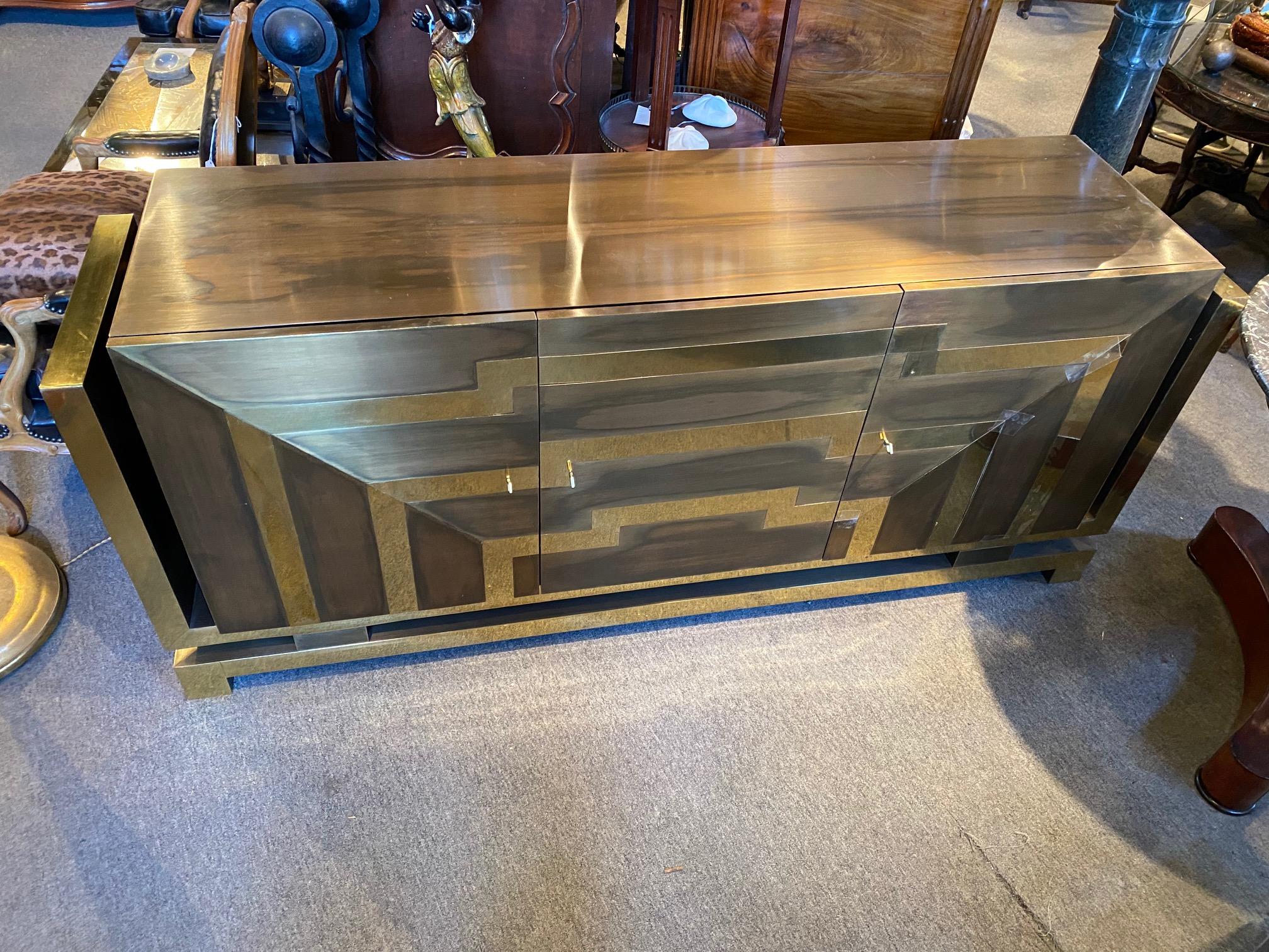 Custom modernist polished and patinated brass veneered three door credenza