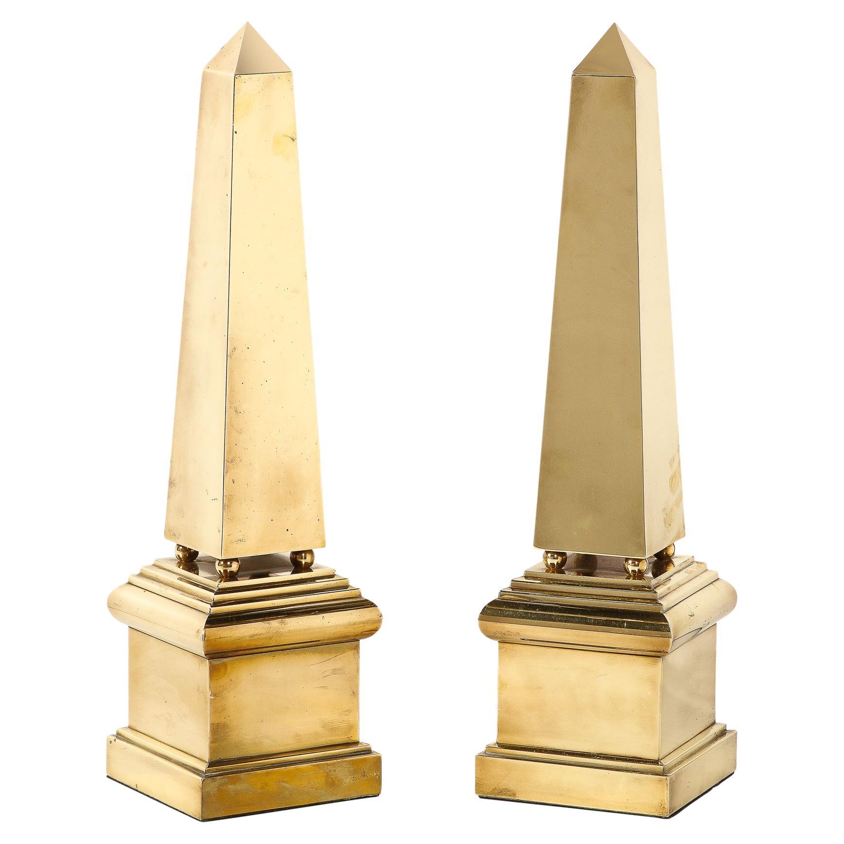 Modernist Polished Brass Obelisks with Tiered and Skyscraper Style Bases