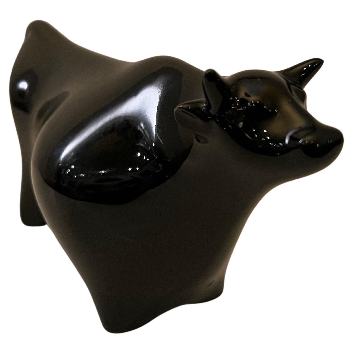 Elegant modernist black glossy porcelain finish ceramic bull in Picasso style.