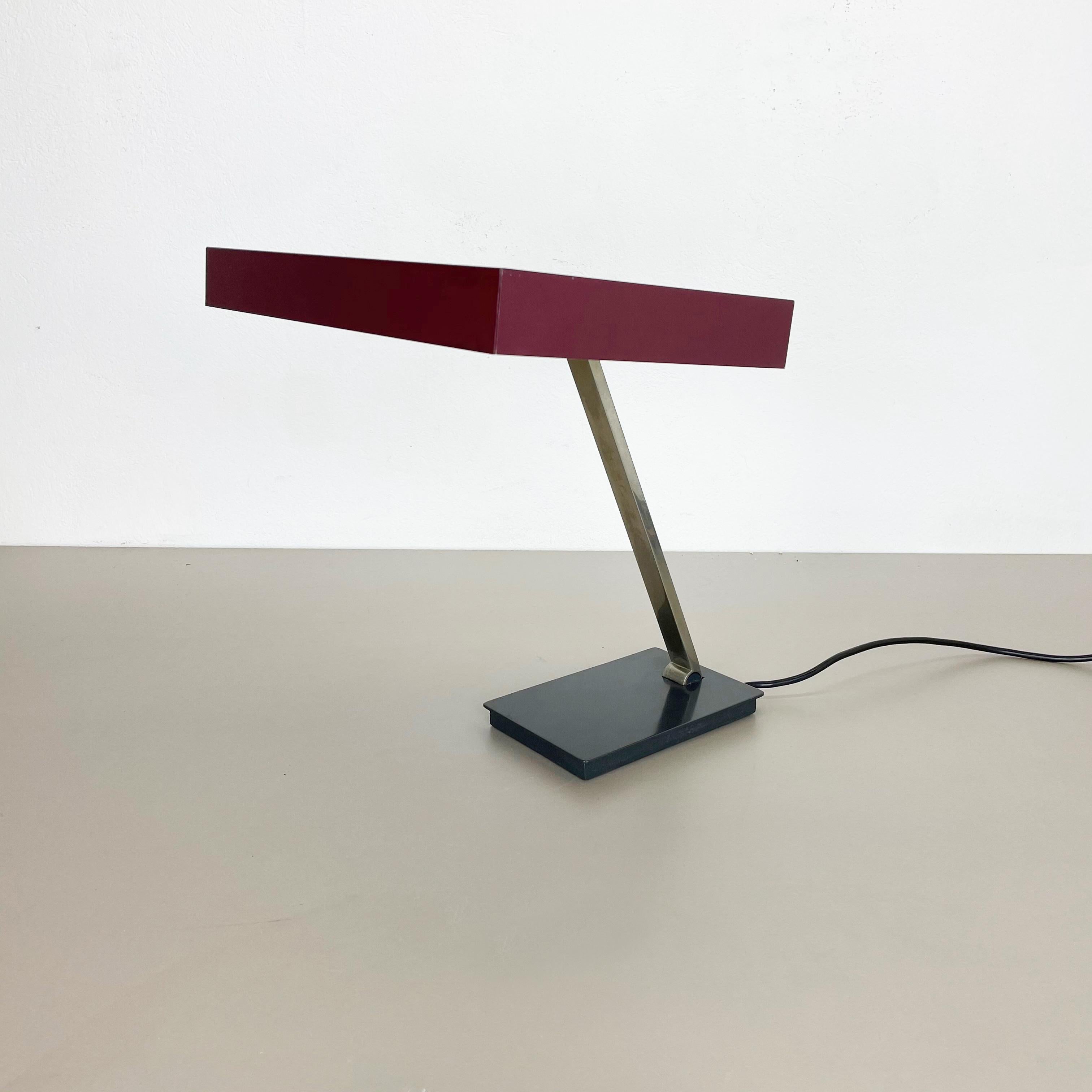 Article:

Table light


Producer:

Kaiser Leuchten, Germany


Origin:

Germany



Age:

1970s






This 1970s table light was made by Kaiser Leuchten in Germany. The light is made of solid metal. The shade has a nice purple