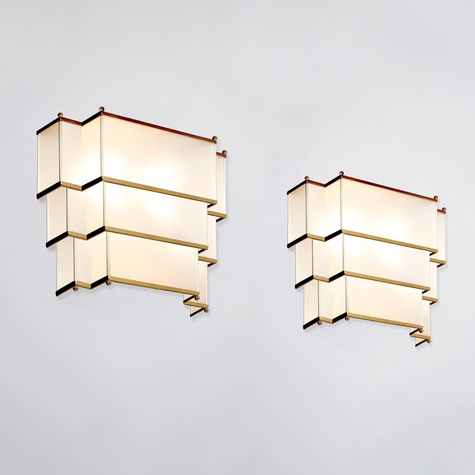 Modernist rectangular wall light made of brushed brass and opal glass, customizable.
Production time: 8-10 weeks.