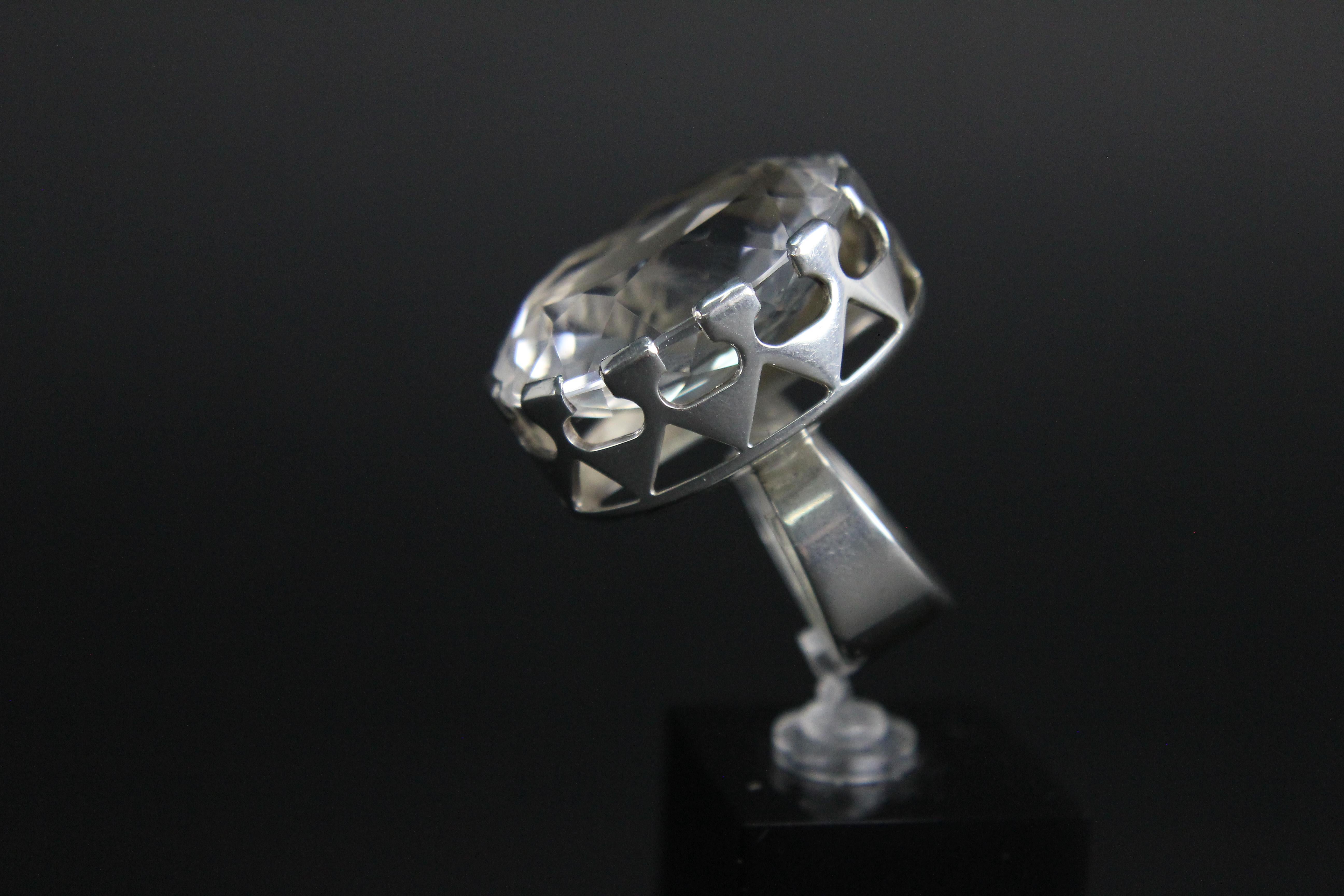 Oval Cut Modernist Ring in Silver and a Large Rock Crystal by Kaplan, Stockholm, 1968 For Sale