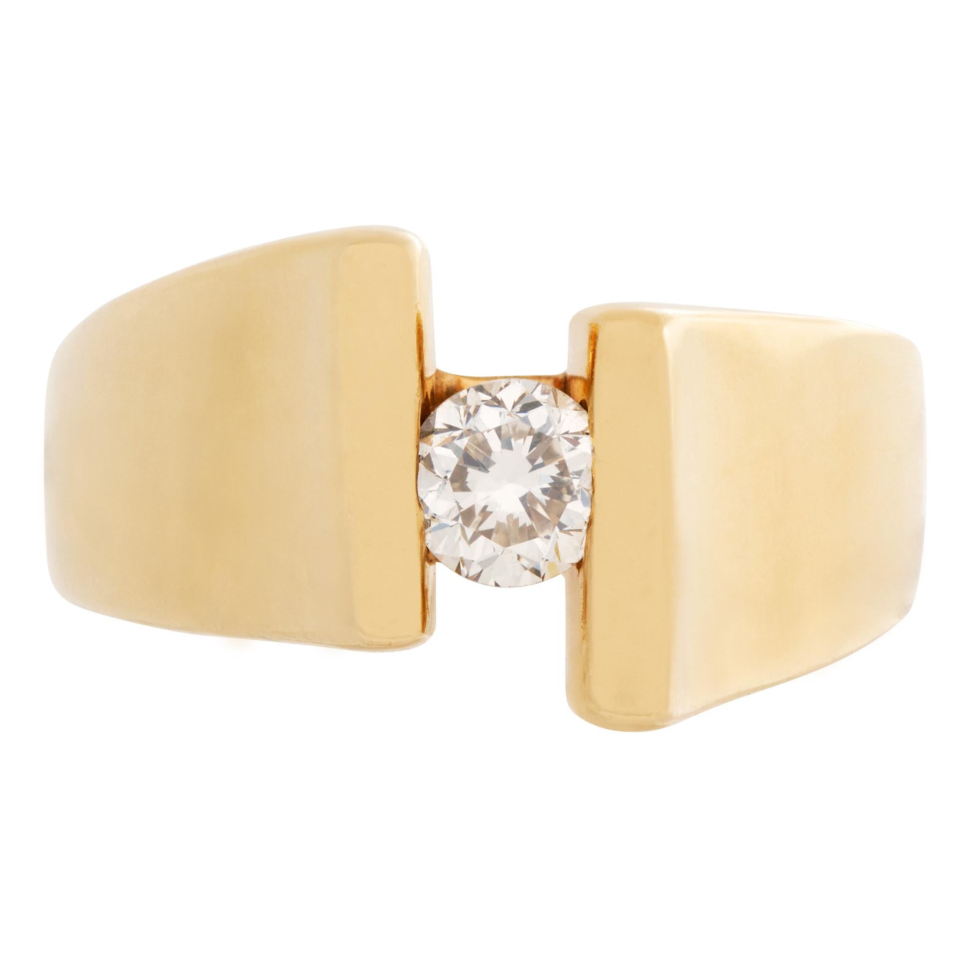 Modernist ring with 0.35 carat full cut round brilliant diamond center set in 14 k yellow gold. Estimate: G-H color, VS-SI clarity. Size 8.5

This Diamond ring is currently size 8.5 and some items can be sized up or down, please ask! It weighs 5.7