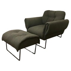 Modernist “Ro” armchair with ottoman upholstery