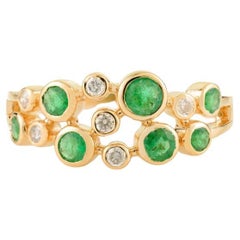 Bague bulle moderniste en or jaune 14 carats avec émeraudes rondes et diamants