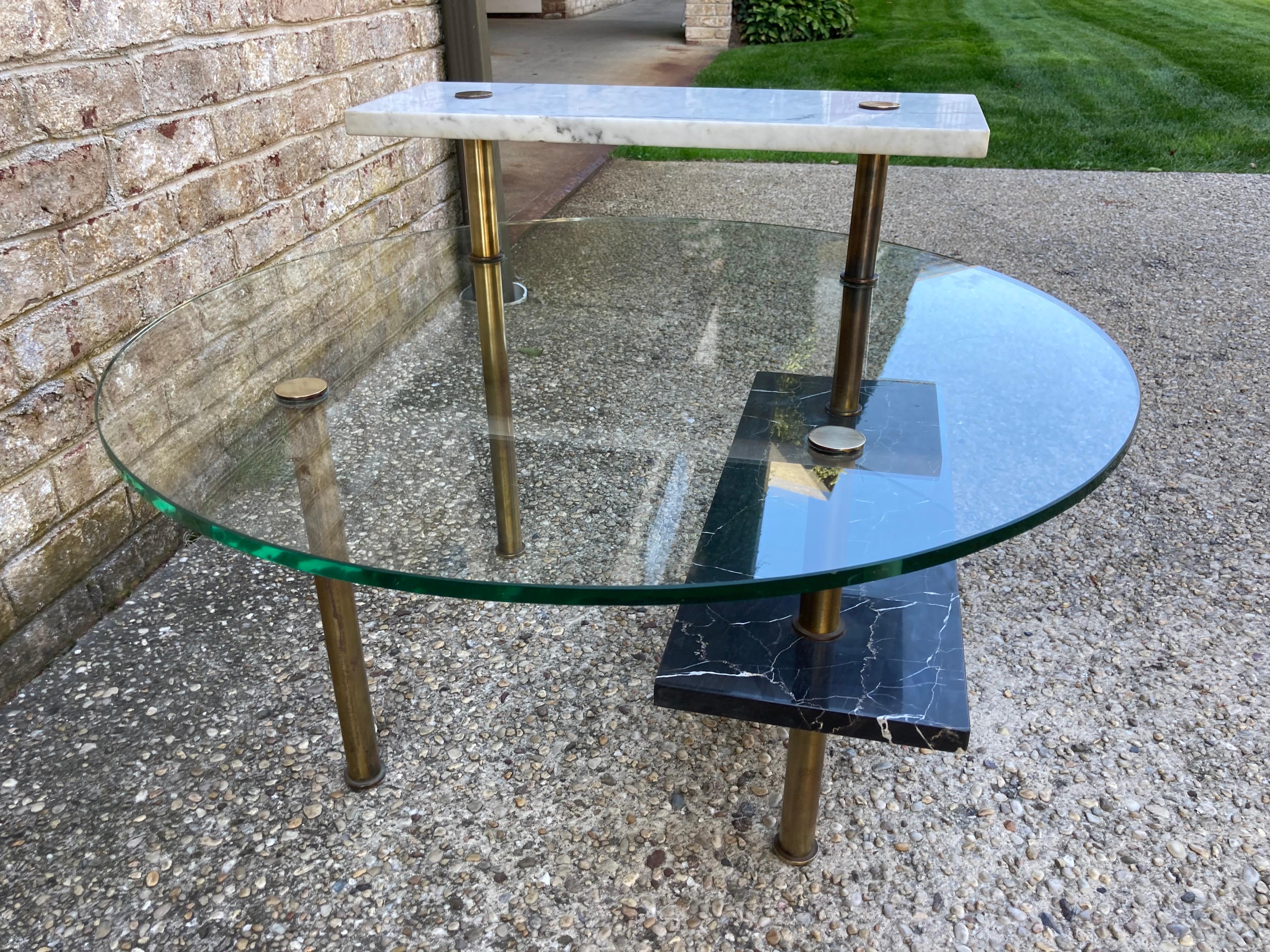 Italian brass, marble, and glass three tiered modern table..... top tier is a white marble rectangle 25