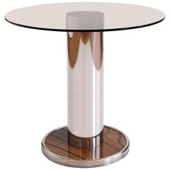 Canapé/table basse rond moderniste, base en acier inoxydable poli et plateau en verre