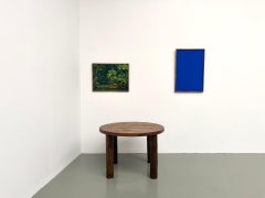 Modernist round solid oak dining table from the 1950s