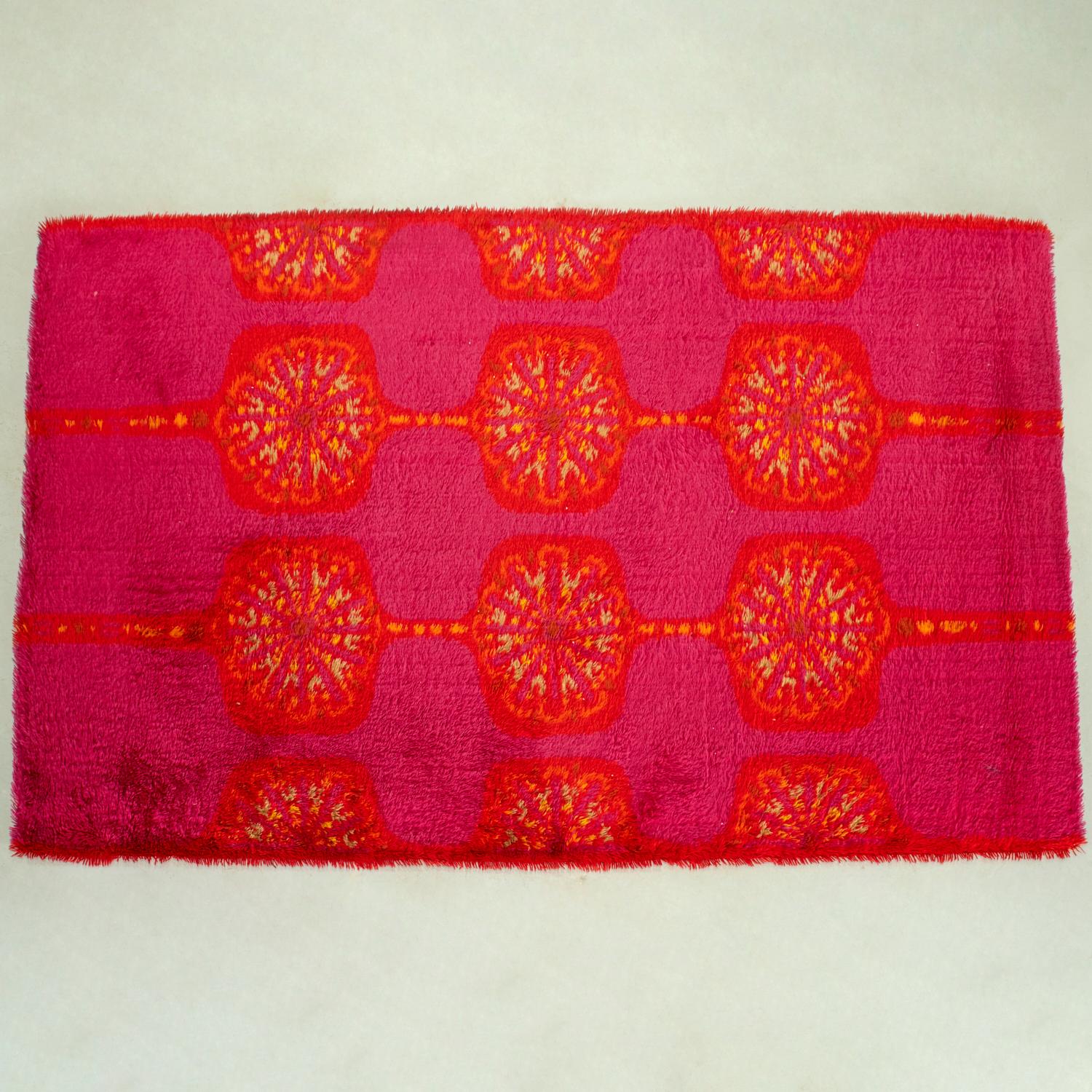 Wool Modernist Rya Shag Carpet, Stylized Red and Orange Florals on a Fuchsia Ground For Sale