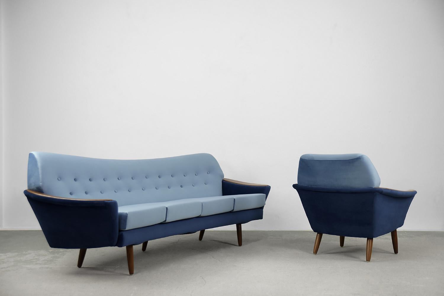This rare modernist lounge set was manufactured by the Swedish manufacturer Holm Fabriker AB in the early 1960s. It consists of a four-seater sofa and an armchair. It was finished with the highest quality velor material in shades of royal blue. The