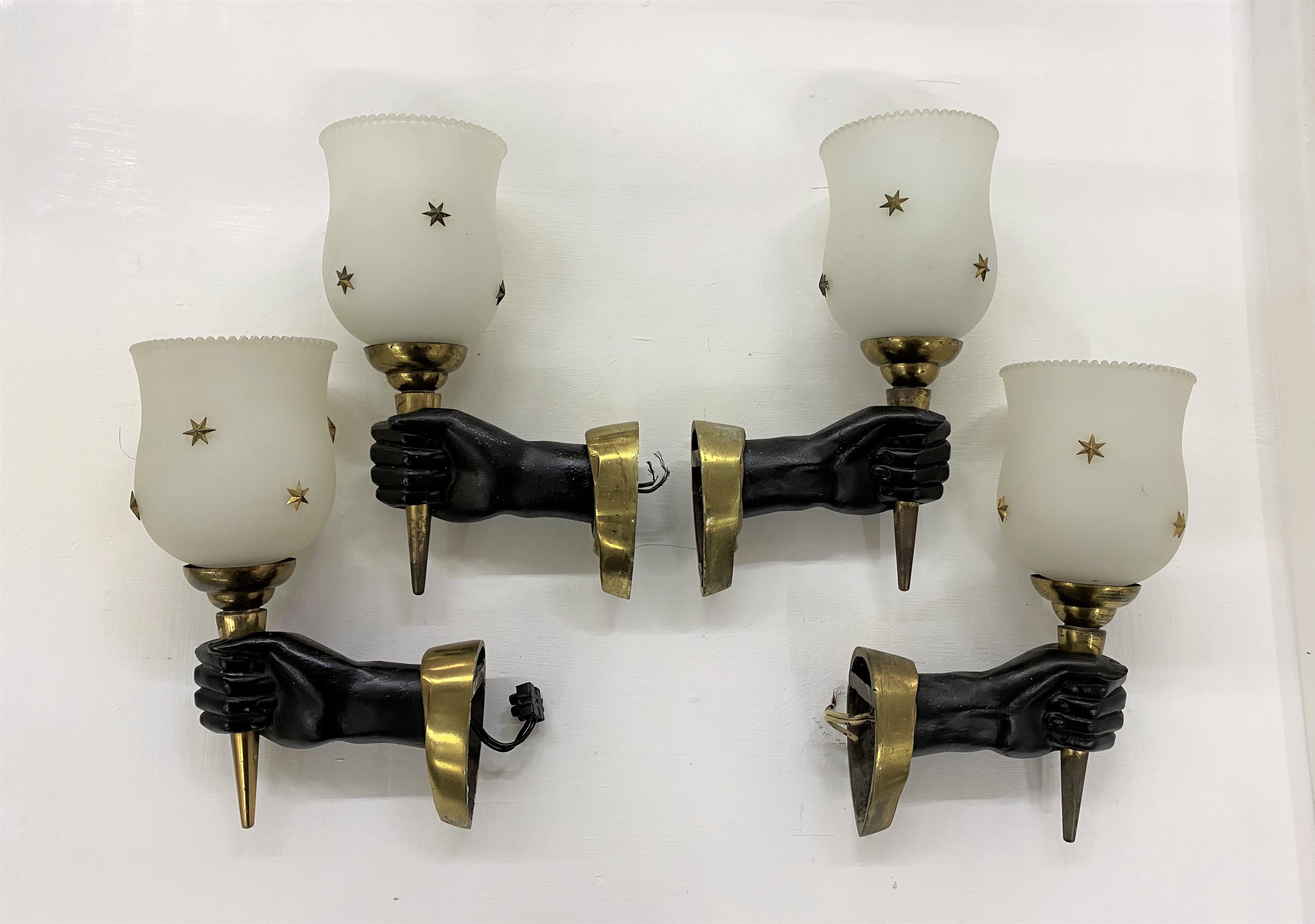 Gorgeous sconces or wall lights produced by Maison Arlus in gilt bronze and opaline glass.
Made in France, circa 1950s.
These are 