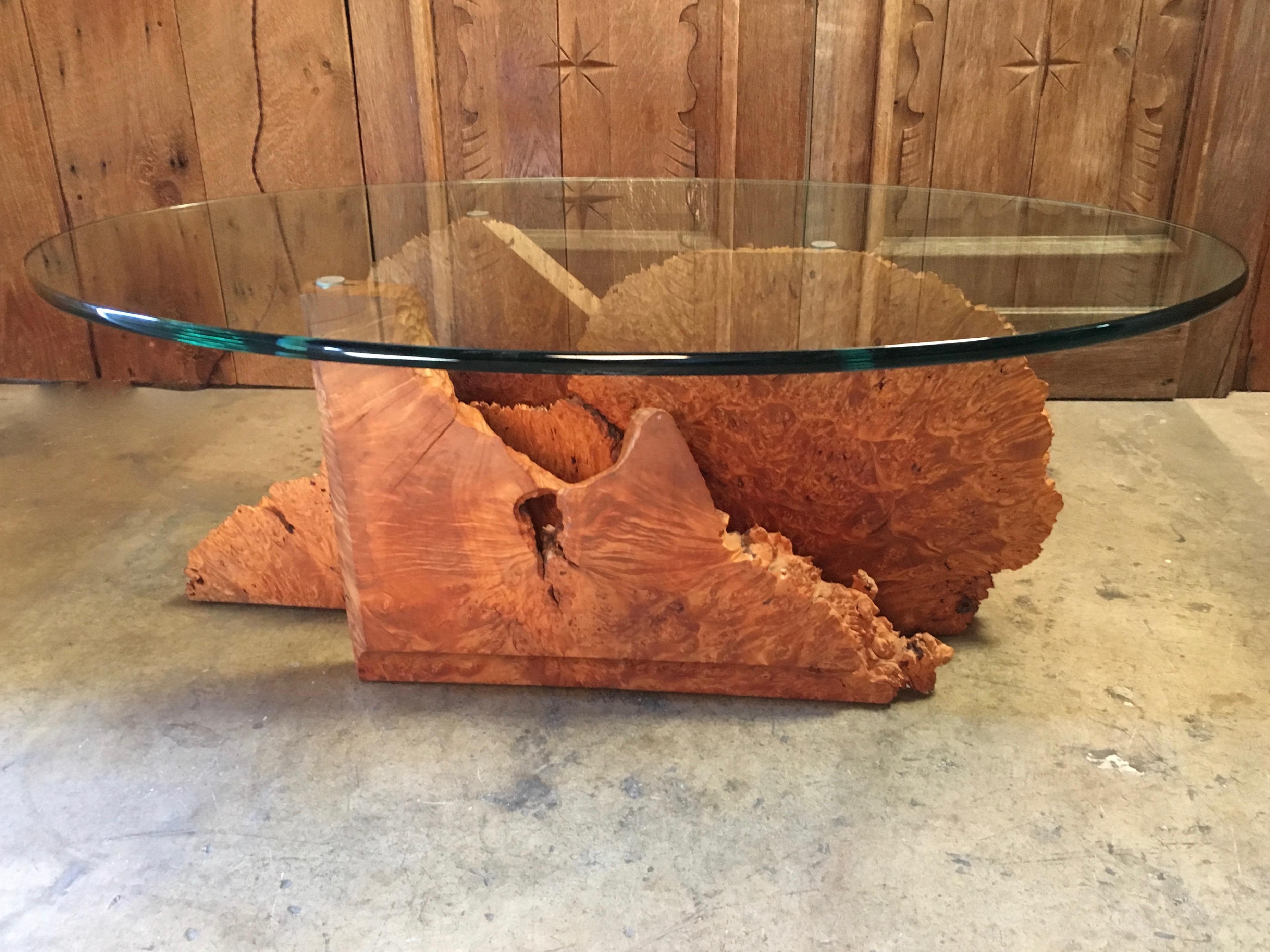 Three separate slabs of burl wood conjoined to make a post modern base for a oval glass top coffee table
Base dimensions 39 L x 13.5 D.