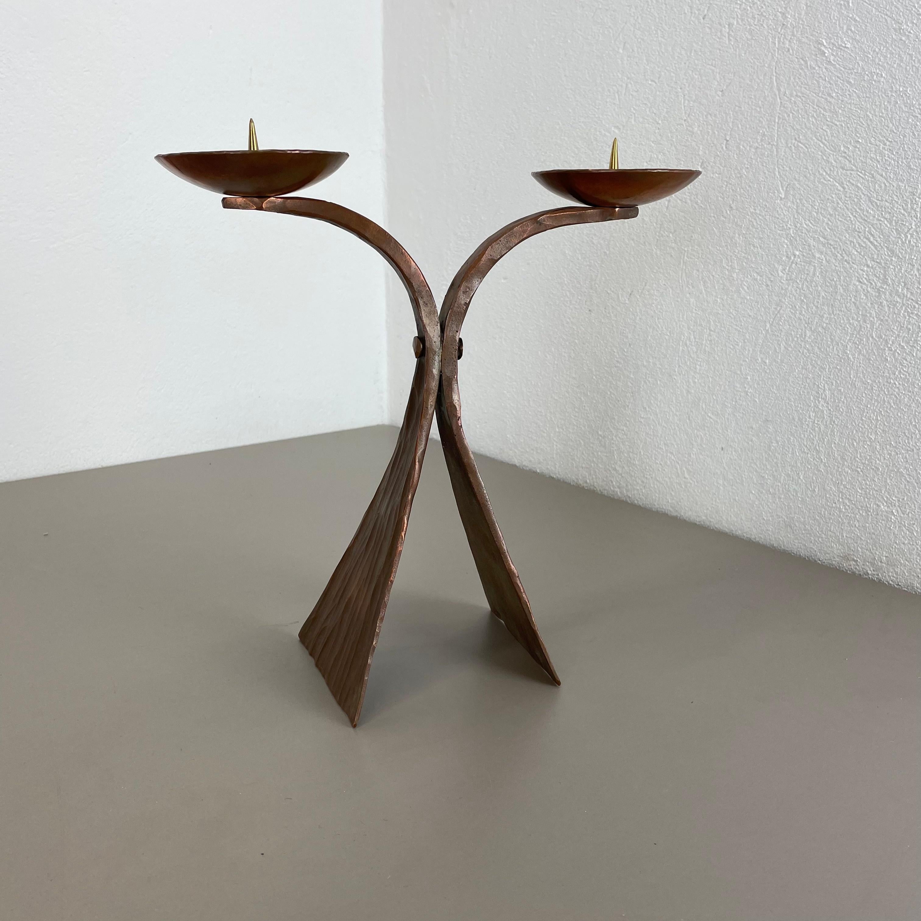 Article:

Brutalist candleholder


Origin:

Austria


Material:

Copper


Decade:

1950s



This original vintage candleholder, was designed and produced in the 1950s in Austria. It is made of solid copper, and has a lovely