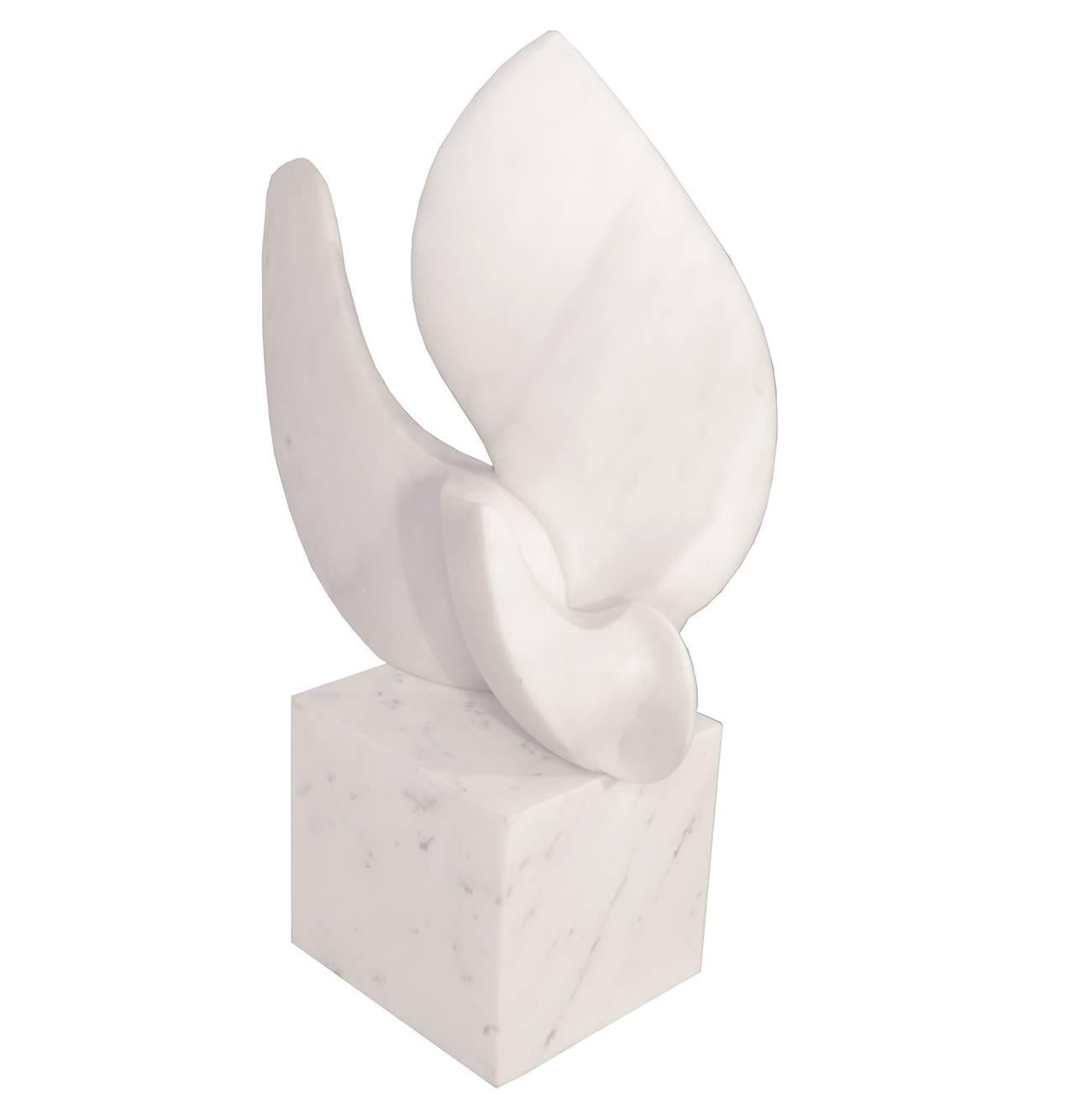 A modernist sculpture of a bird, possibly a swan, carved in marble by Jack Zajac, b. 1929. The sculpture is reminiscent of works by Hepworth, Noguchi and Brancusi.