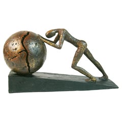 Escultura modernista " La vida es una batalla cuesta arriba contra el mundo"